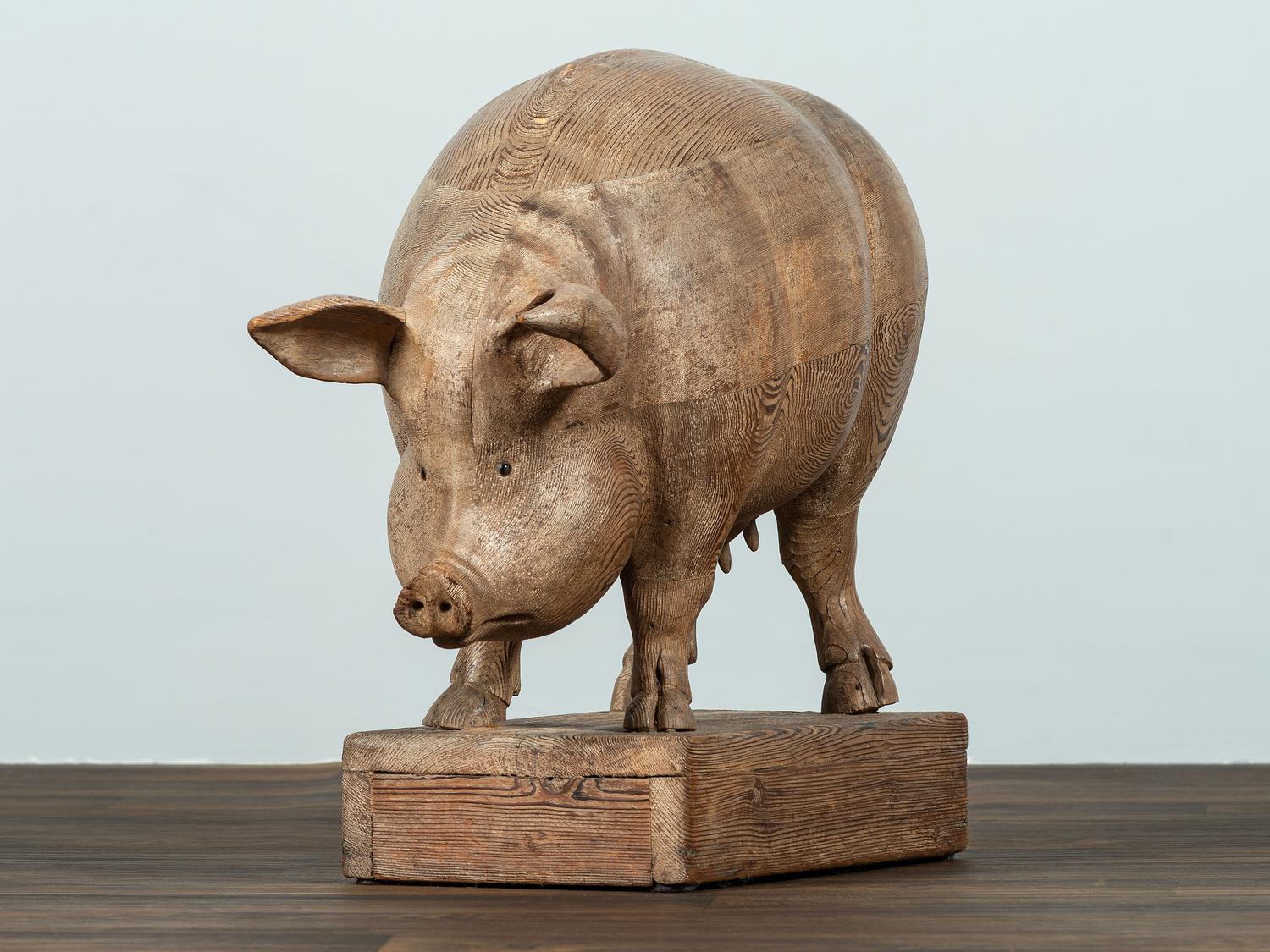A Folk Art Carved Wood Figure of a Sow