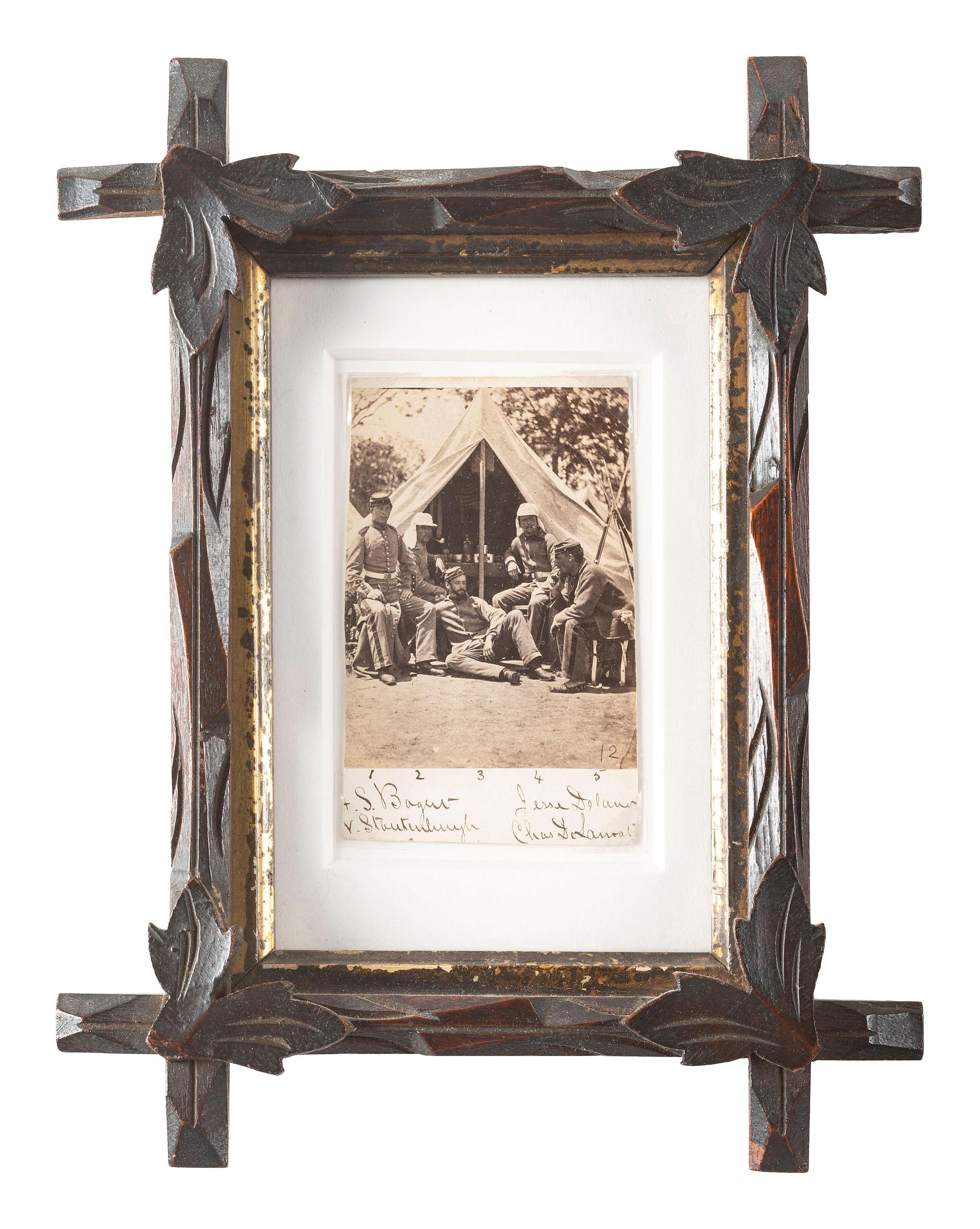 [CIVIL WAR]. Albumen photograph of five soldiers from the 7th New York State Militia, 7th Company, at camp. Washington, DC, 1861.