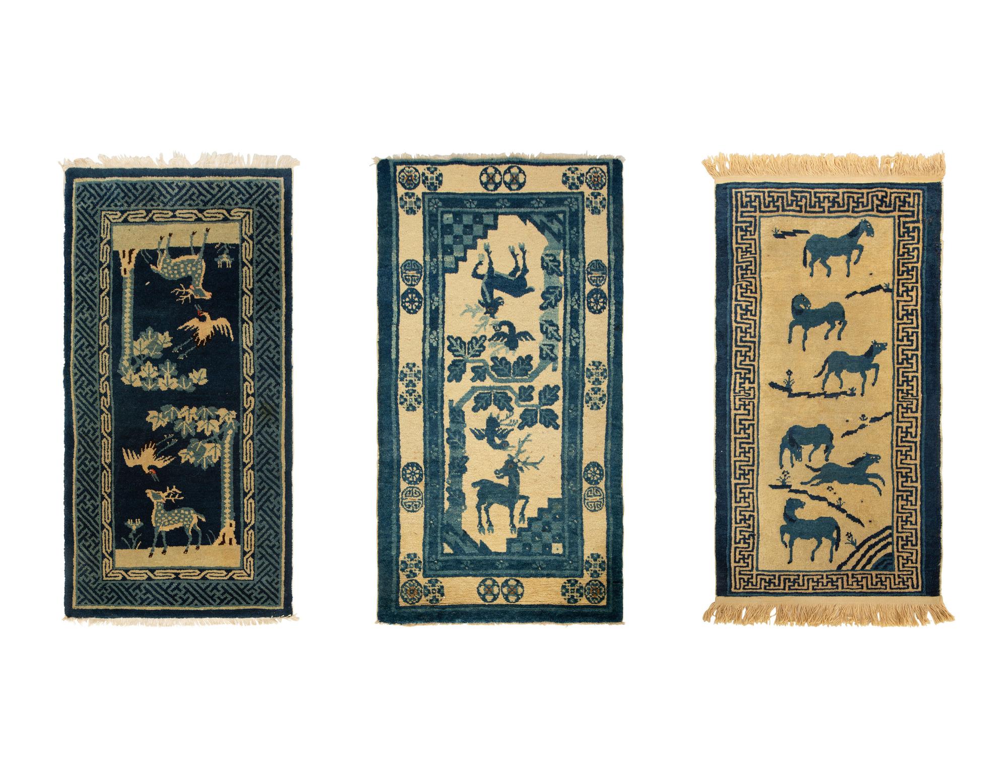 A Group of Three Chinese Rugs