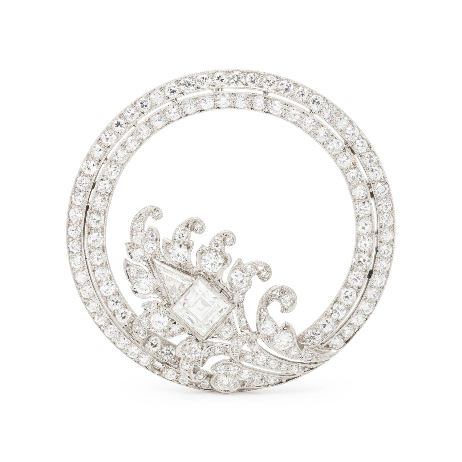 DIAMOND AND PLATINUM CIRCLE BROOCH
