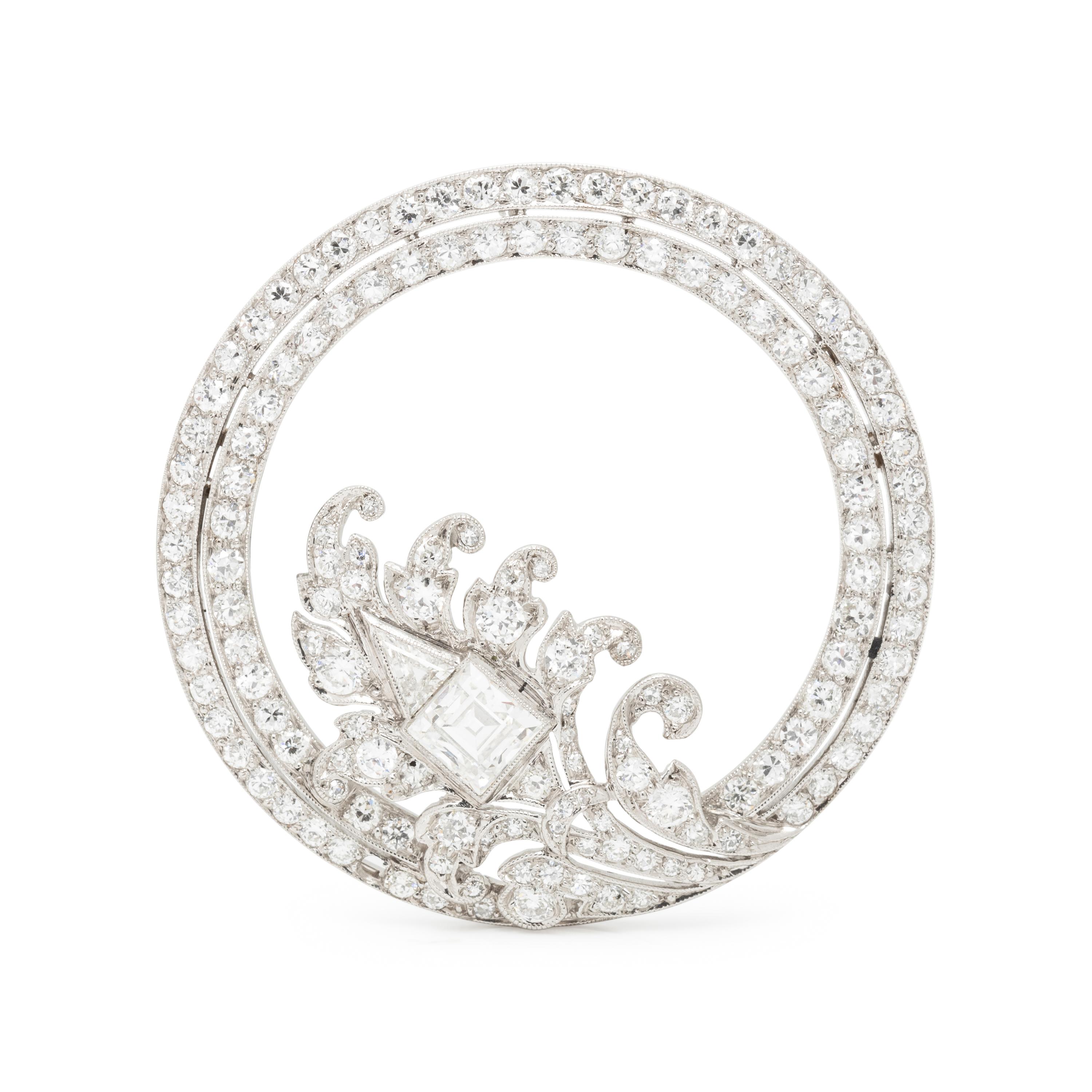 DIAMOND AND PLATINUM CIRCLE BROOCH