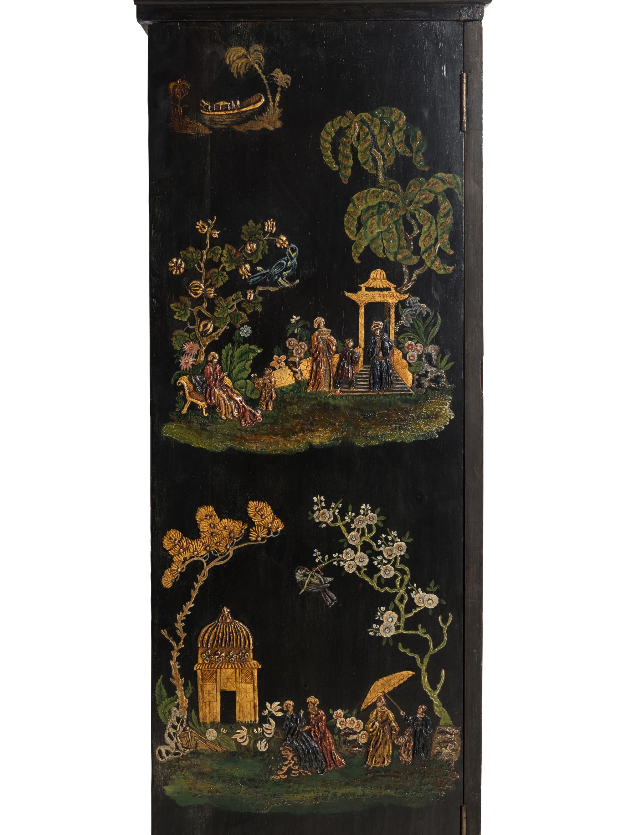 A Queen Anne Style Polychrome and Black Japanned Bookcase on Stand