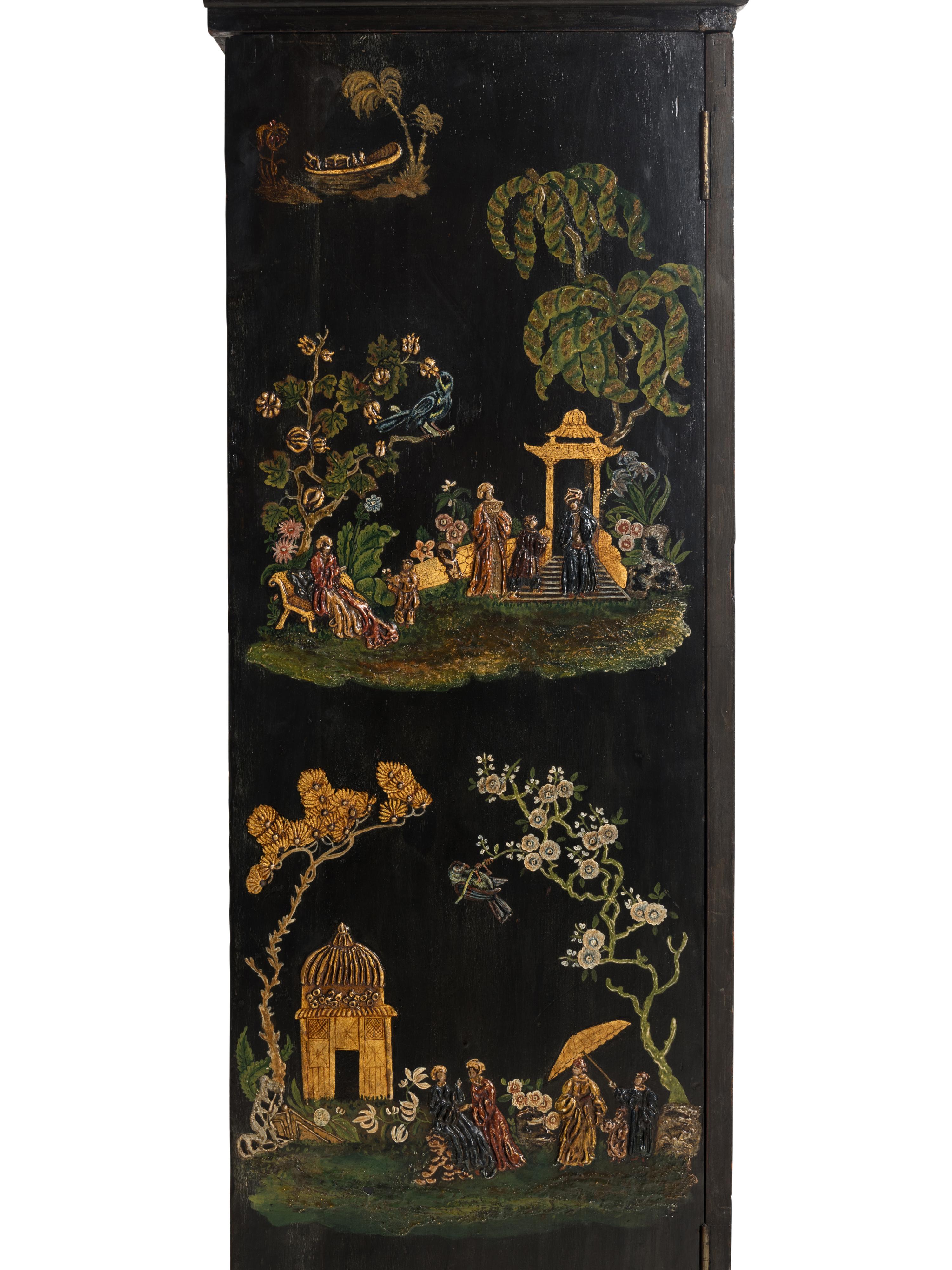 A Queen Anne Style Polychrome and Black Japanned Bookcase on Stand