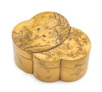 A Gilt Lacquer Double Covered Box Length 4 1/4 inches.