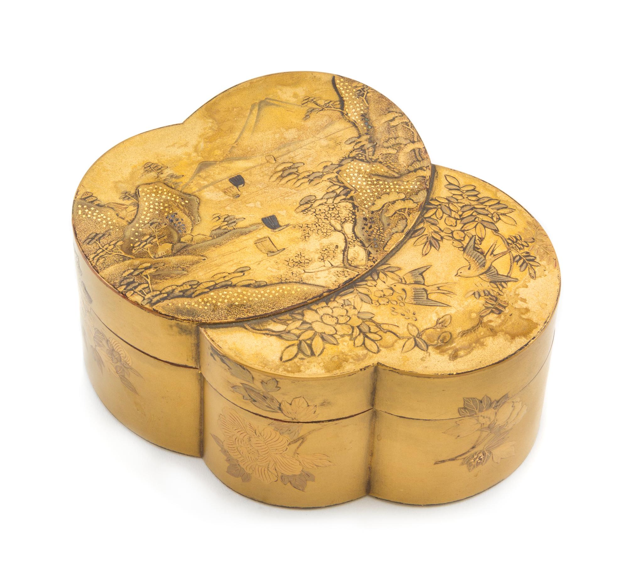 A Gilt Lacquer Double Covered Box Length 4 1/4 inches.