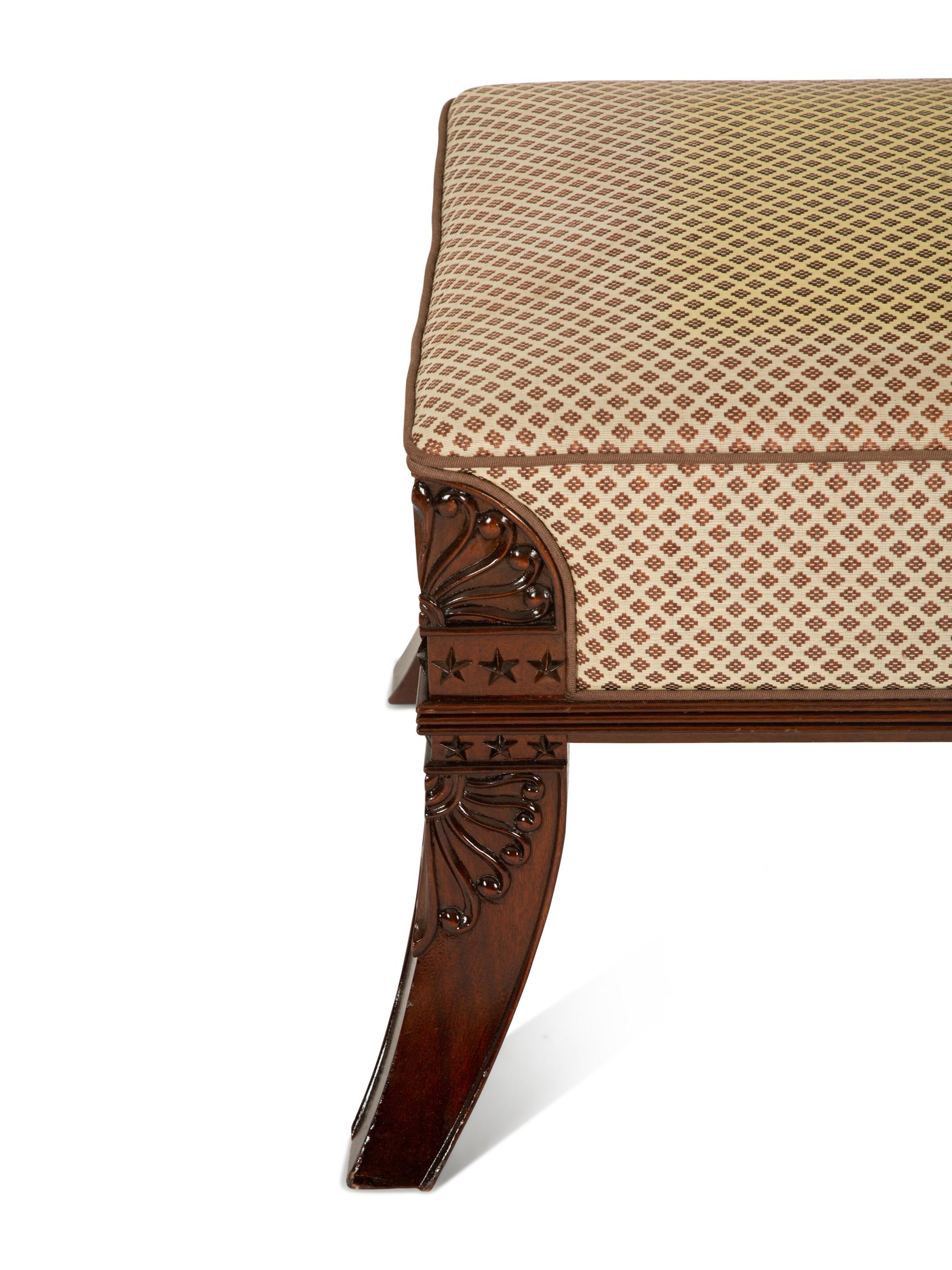 An Egyptian Revival Carved Mahogany Ottoman with Upholstered Seat — 20th Century