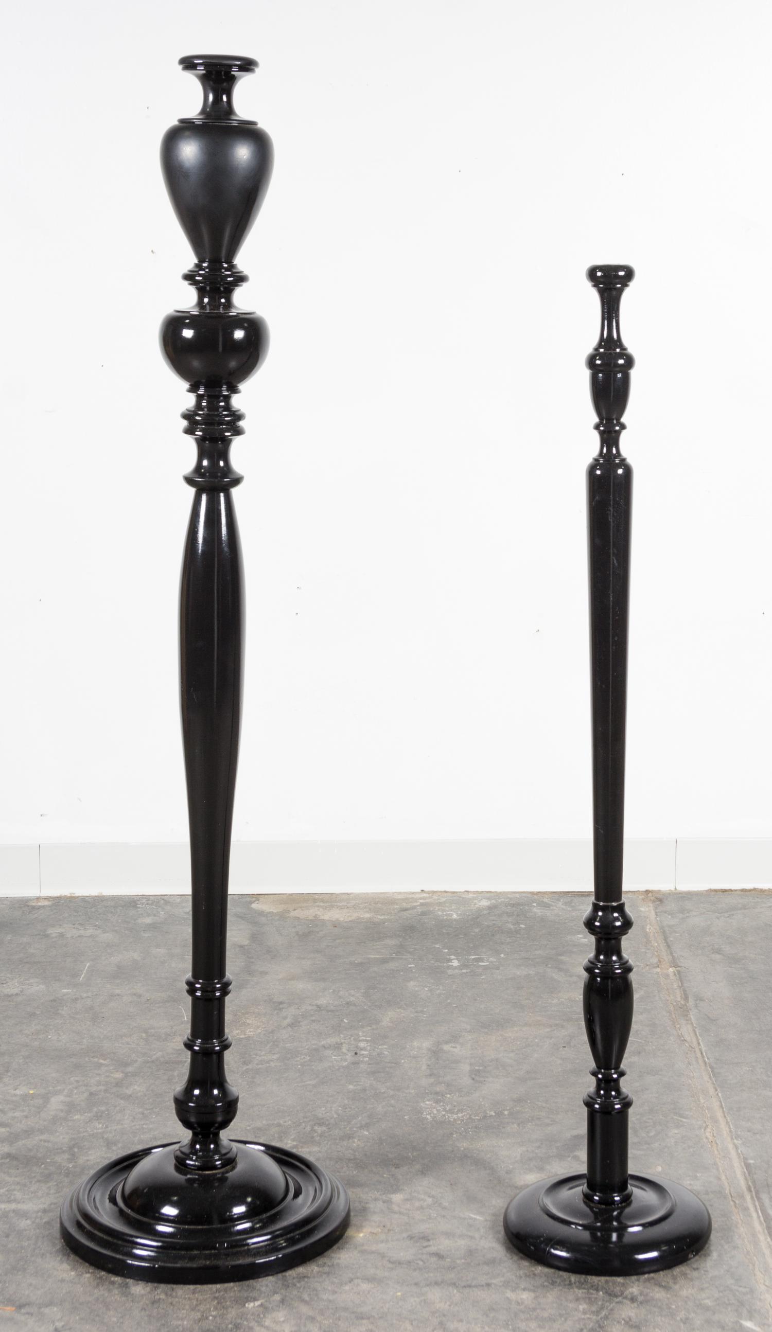 A Pair of Ebonized Turned Wood Floor Lamp Bases Height of tallest 59 1/2 inches.