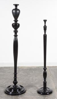 A Pair of Ebonized Turned Wood Floor Lamp Bases Height of tallest 59 1/2 inches.