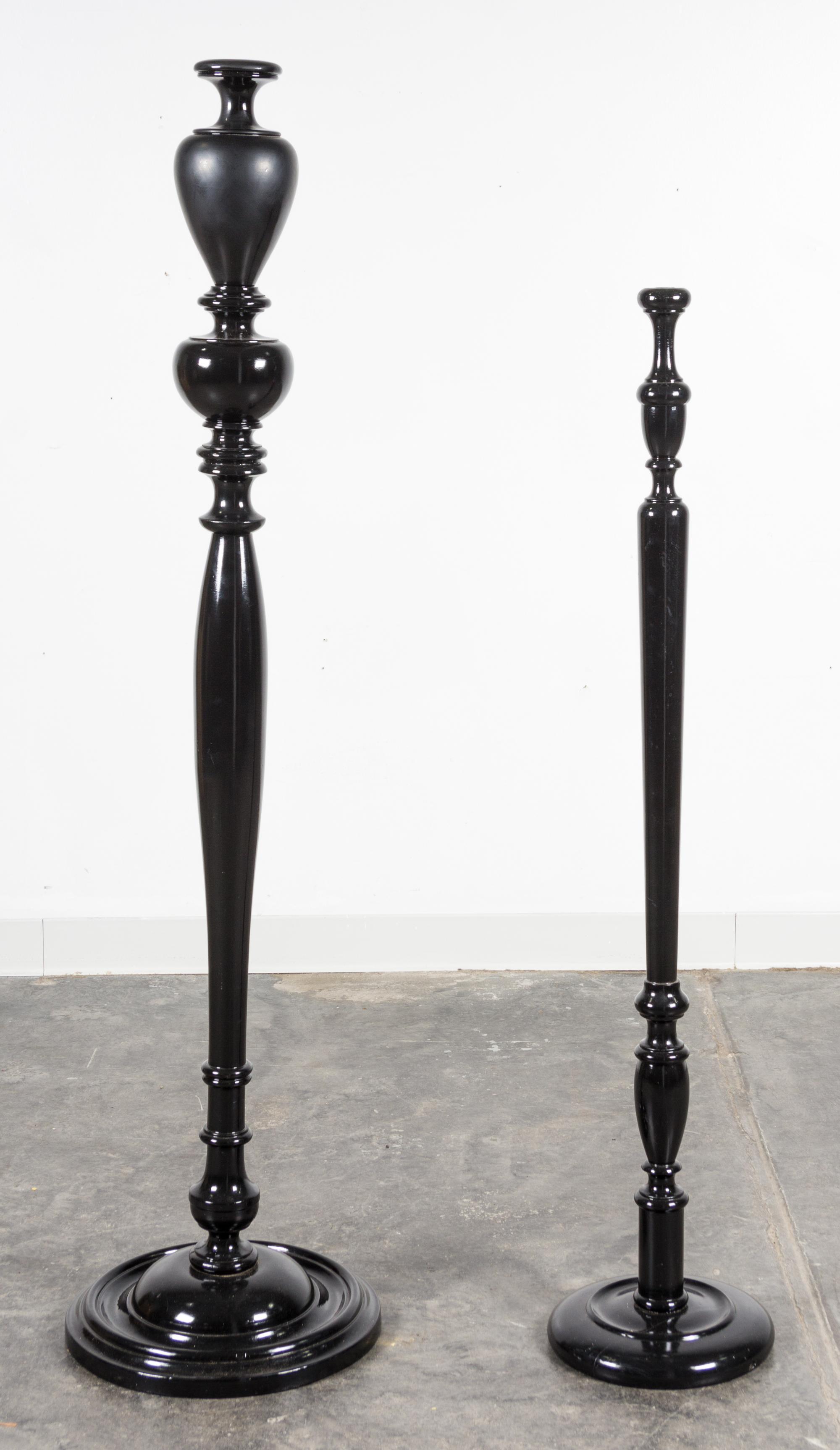 A Pair of Ebonized Turned Wood Floor Lamp Bases Height of tallest 59 1/2 inches.