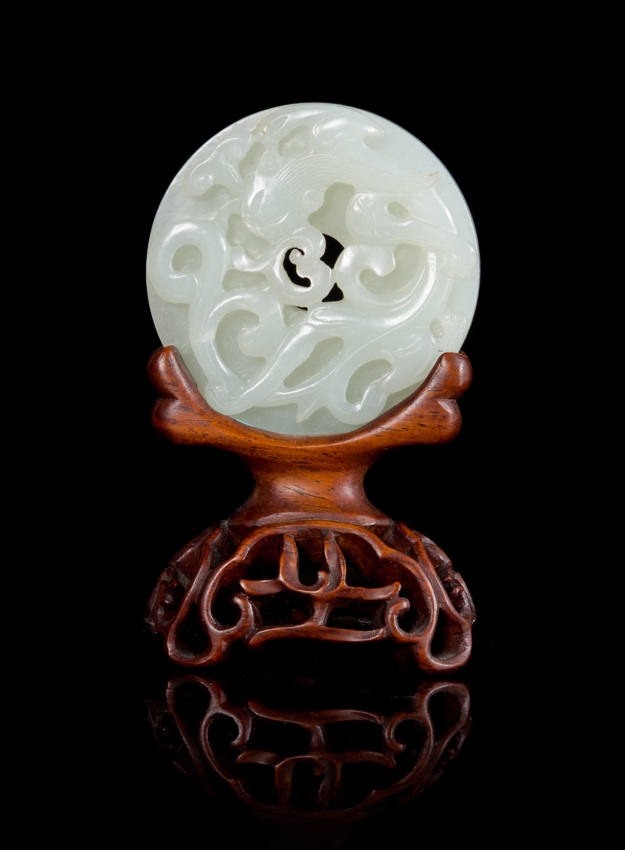 A White Jade 'Dragon' Bi Disc Diameter 2 1/4 inches. — 18TH/19TH CENTURY