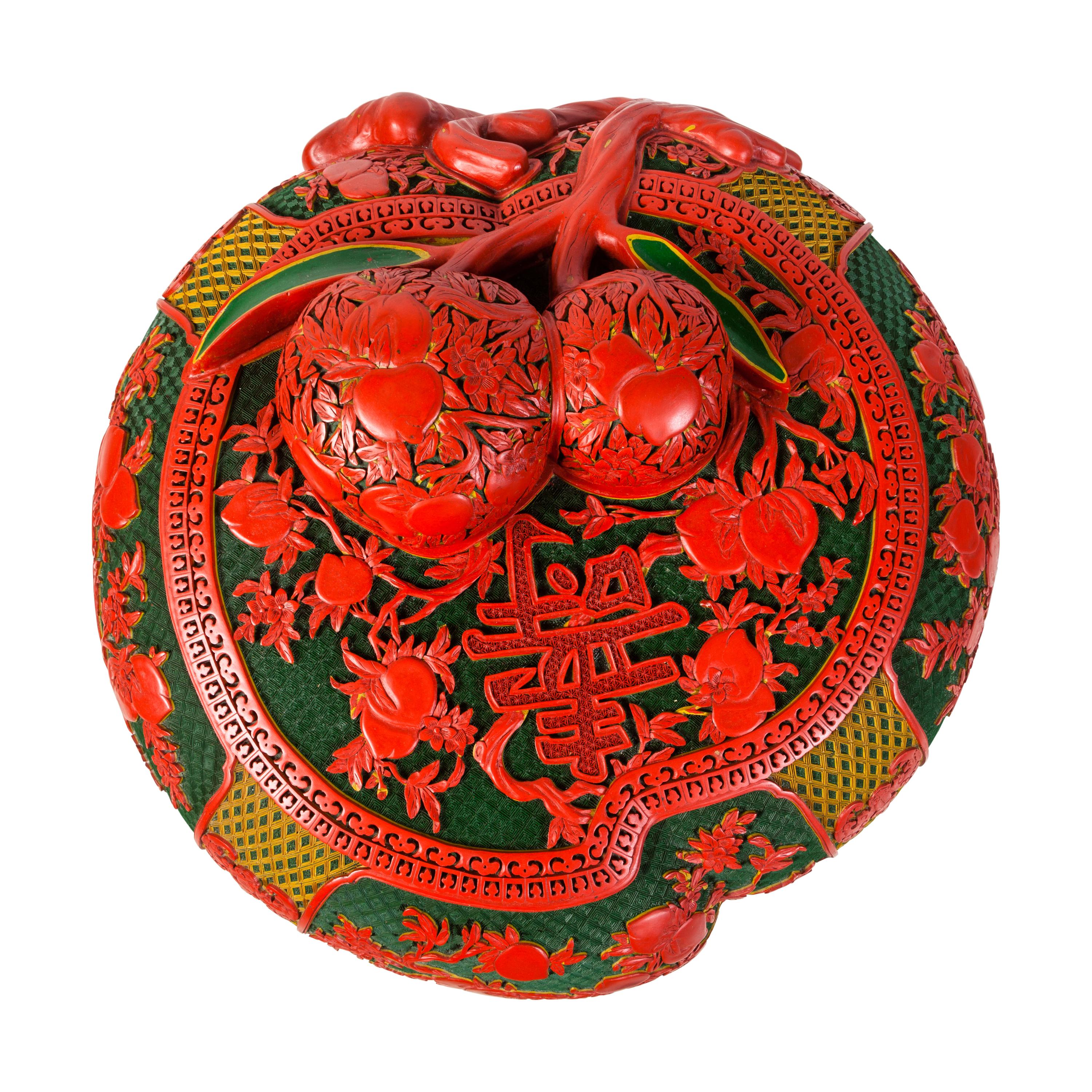 A Set of Chinese Export Carved Red Lacquer "Peach" Nesting Boxes and a Stand