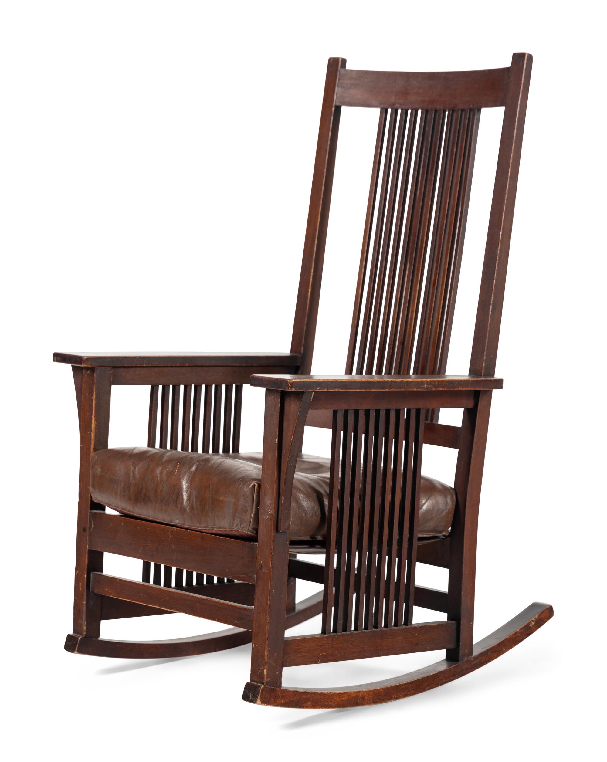 A Stickley Style Oak Rocking Arm Chair