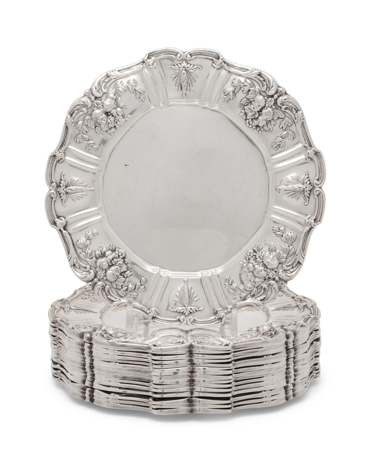 A Set of Sixteen American Silver Bread Plates