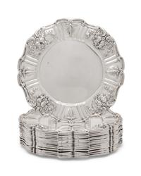 A Set of Sixteen American Silver Bread Plates