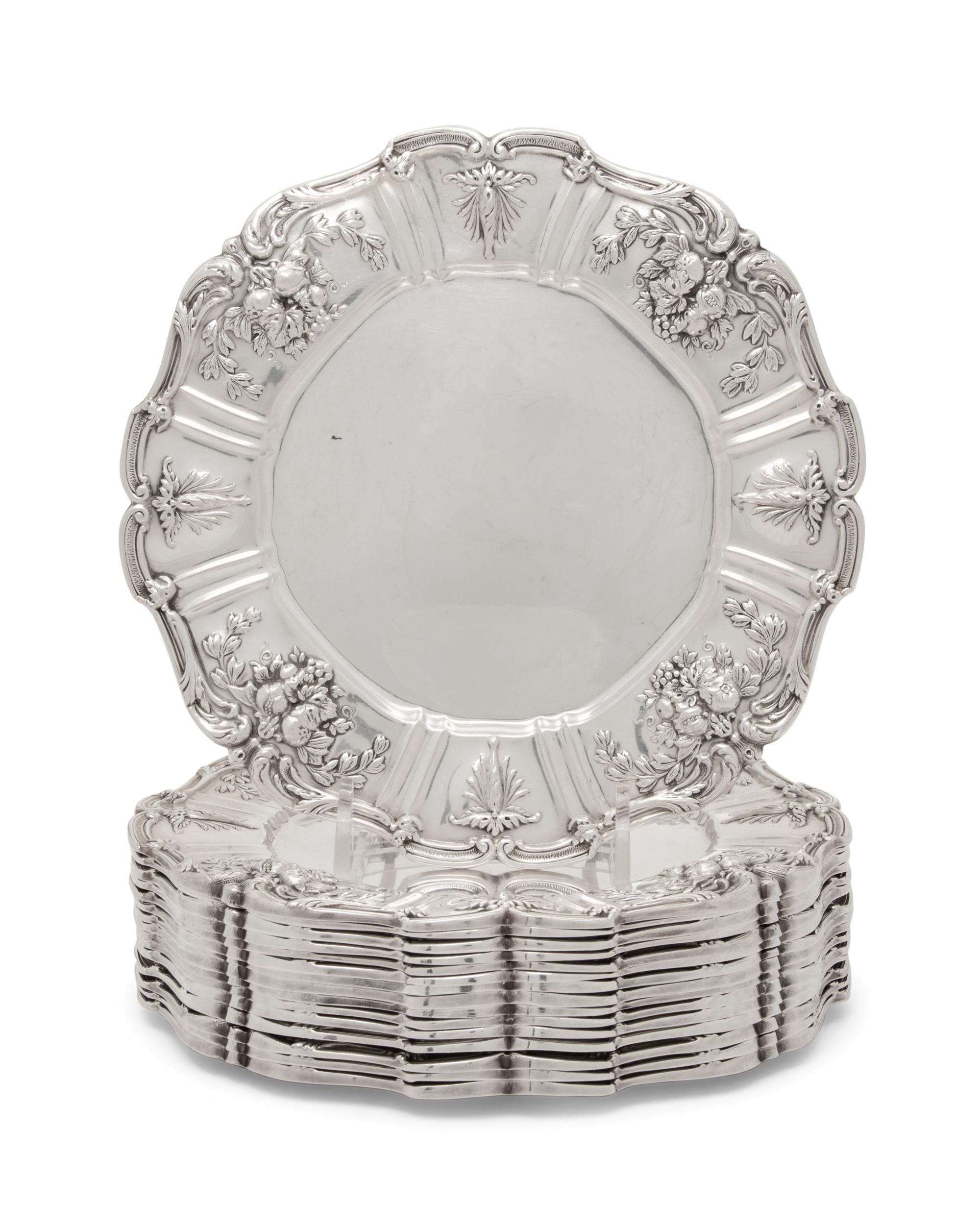 A Set of Sixteen American Silver Bread Plates