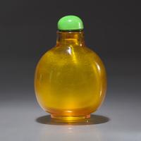 A Chinese Yellow Glass Snuff Bottle, Qing Dynasty, Early 19th Century — 清中期 黃料素面鼻煙壺