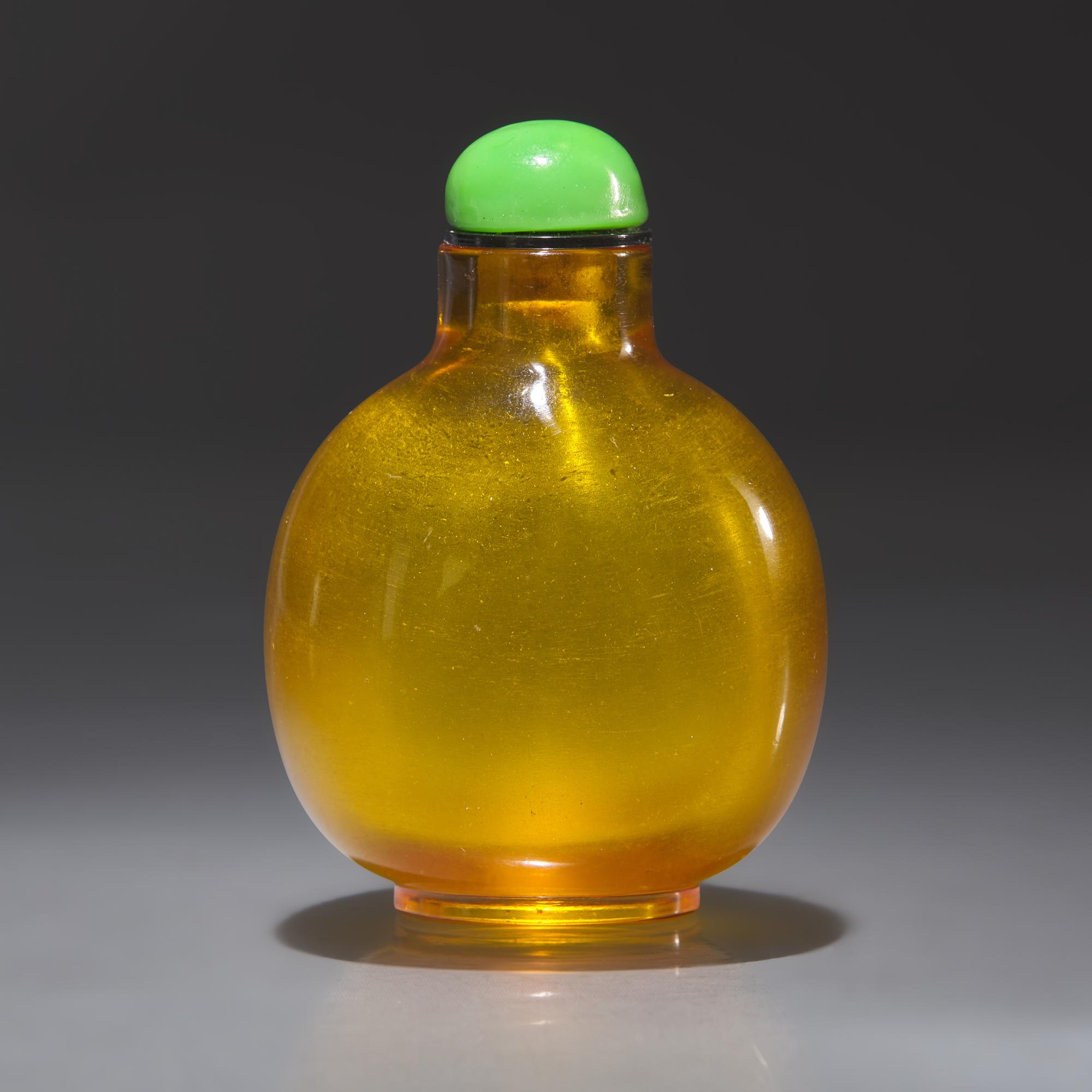 A Chinese Yellow Glass Snuff Bottle, Qing Dynasty, Early 19th Century — 清中期 黃料素面鼻煙壺