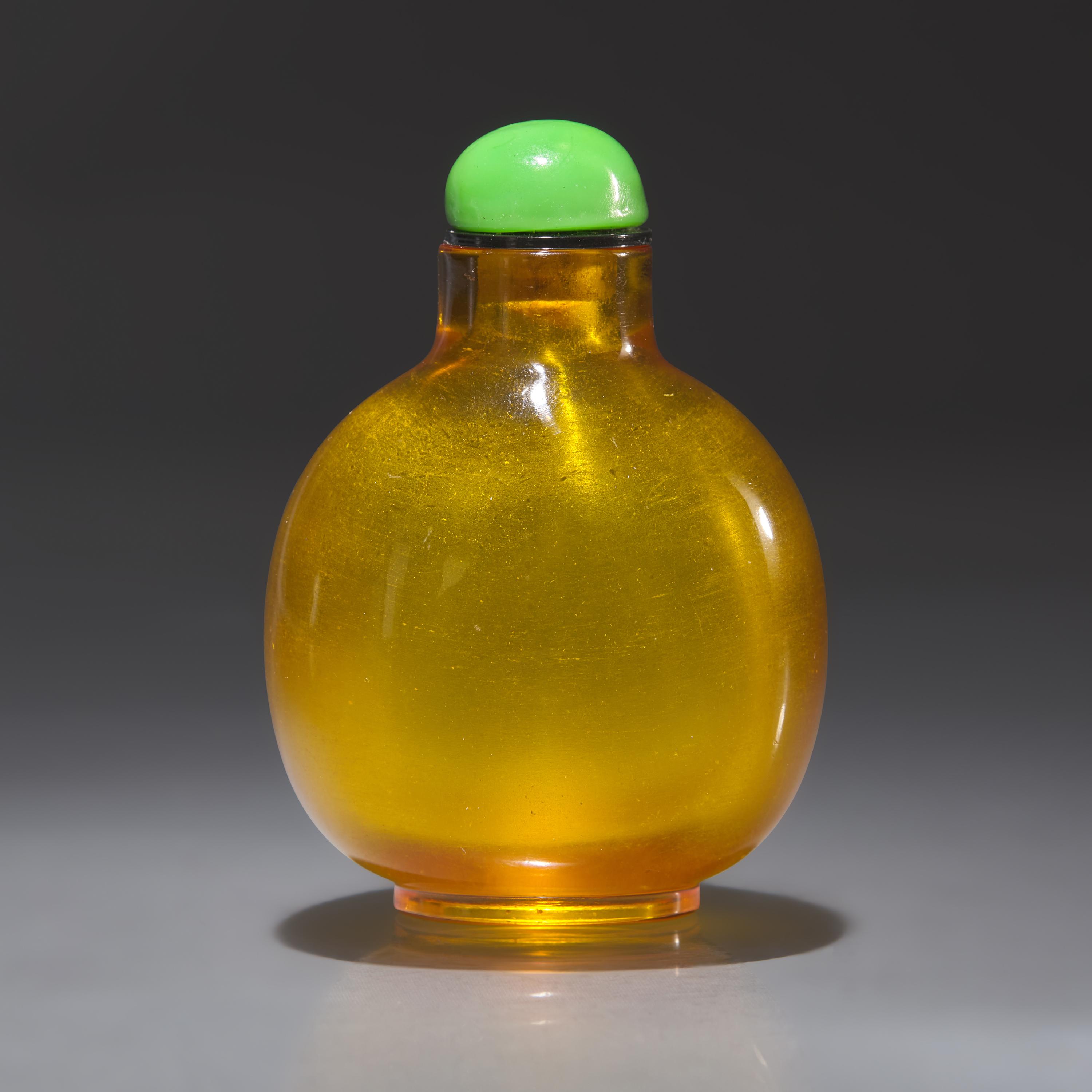A Chinese Yellow Glass Snuff Bottle, Qing Dynasty, Early 19th Century — 清中期 黃料素面鼻煙壺