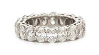 A Platinum and Diamond Eternity Band, 5.90 dwts.