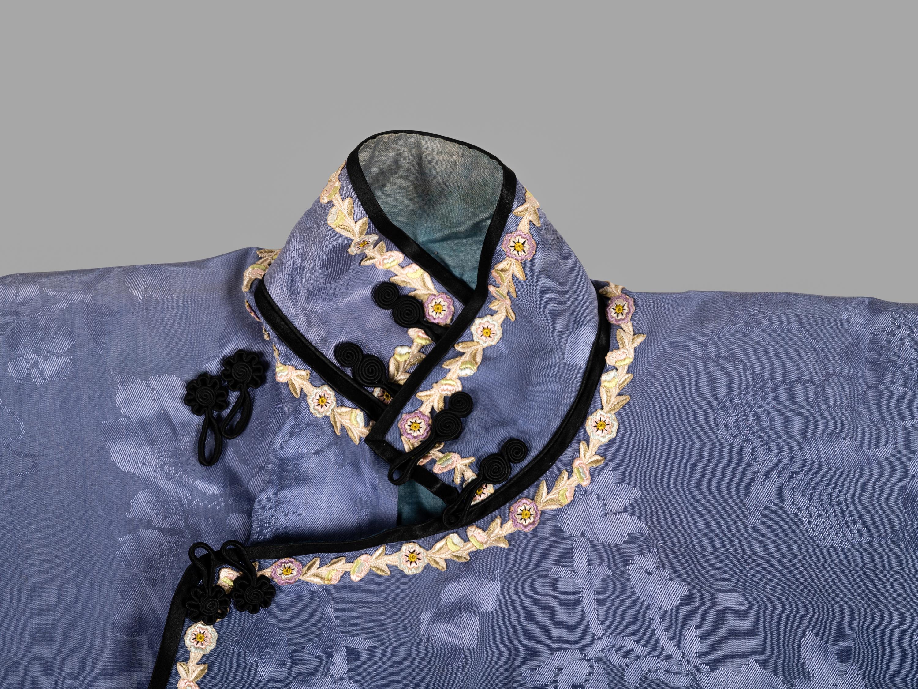 A Chinese Blue Ground Woven Silk Lady's Robe