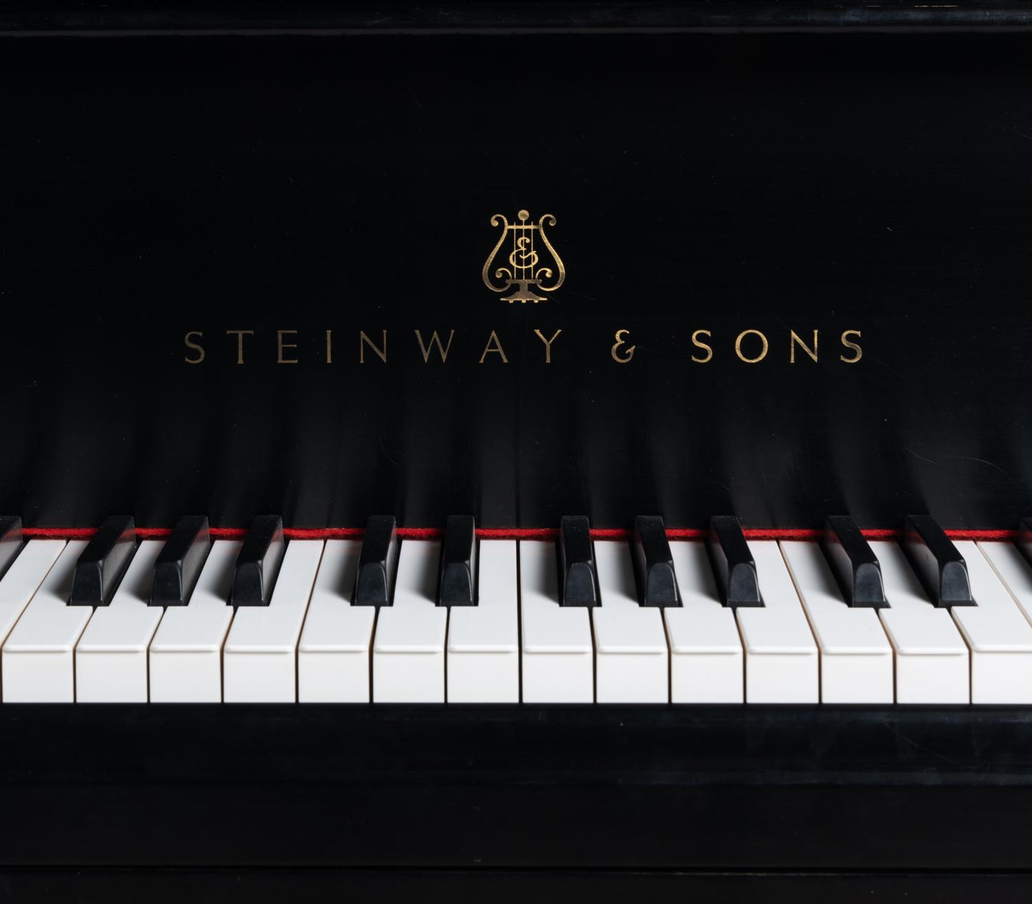 A Steinway and Sons Black Lacquer Model S Baby Grand Piano