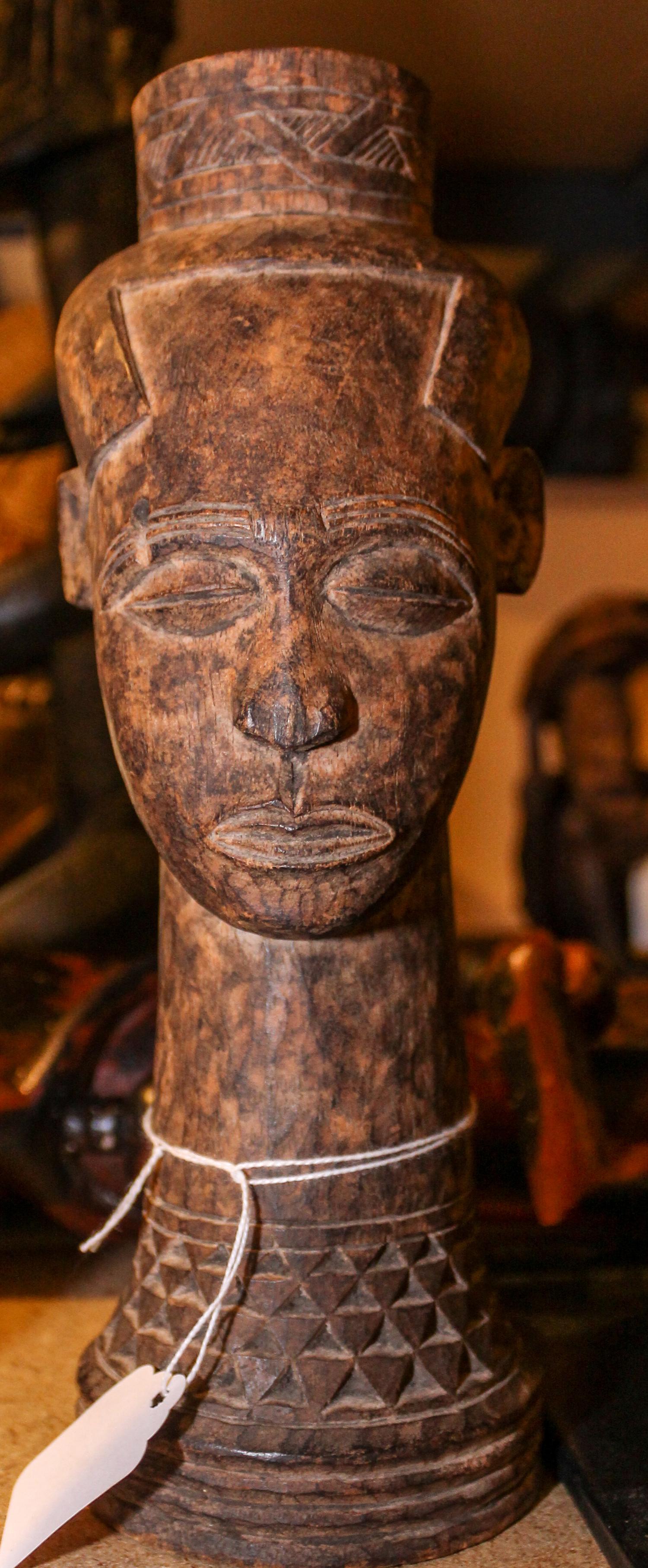 An African Carved Wood Bust Height 10 inches.