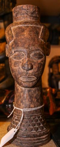 An African Carved Wood Bust Height 10 inches.
