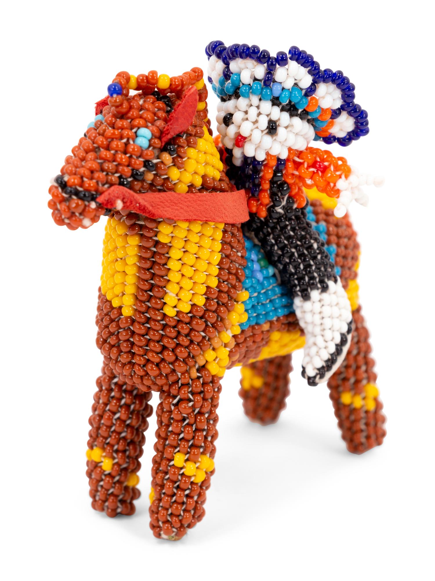 Menagerie of Beaded Zuni Dolls and Animals