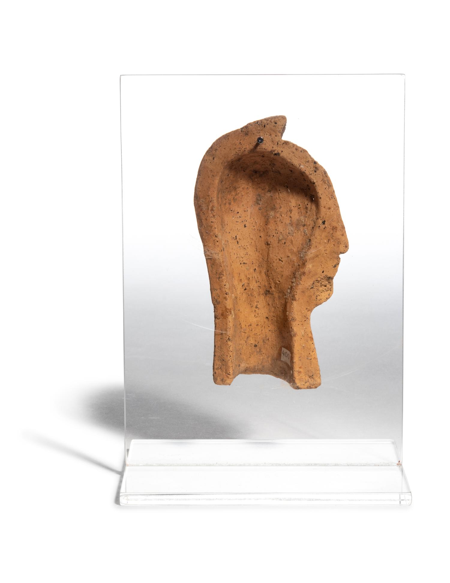 An Etruscan Terra Cotta Votive Half Head