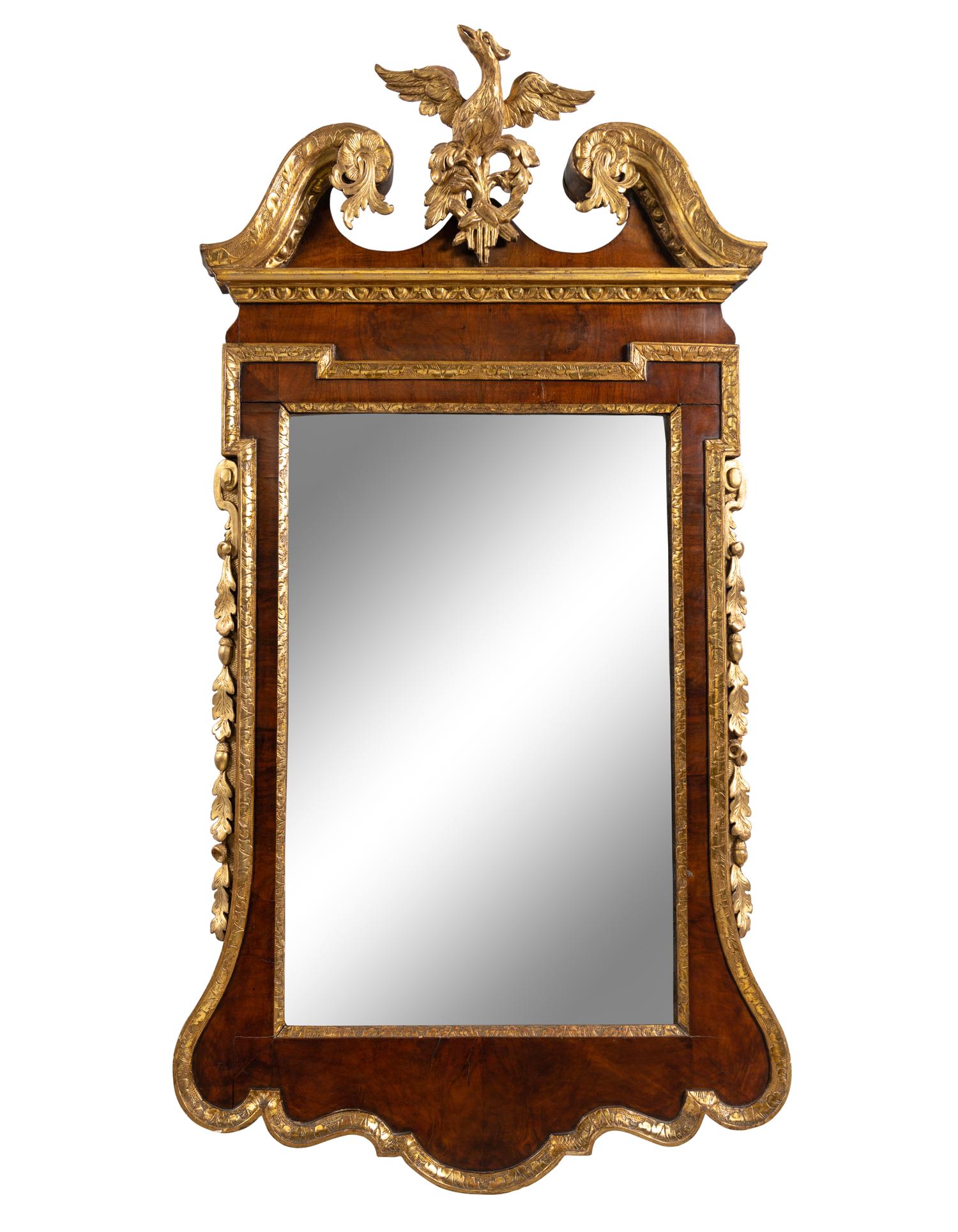A George II Walnut and Parcel Gilt Mirror