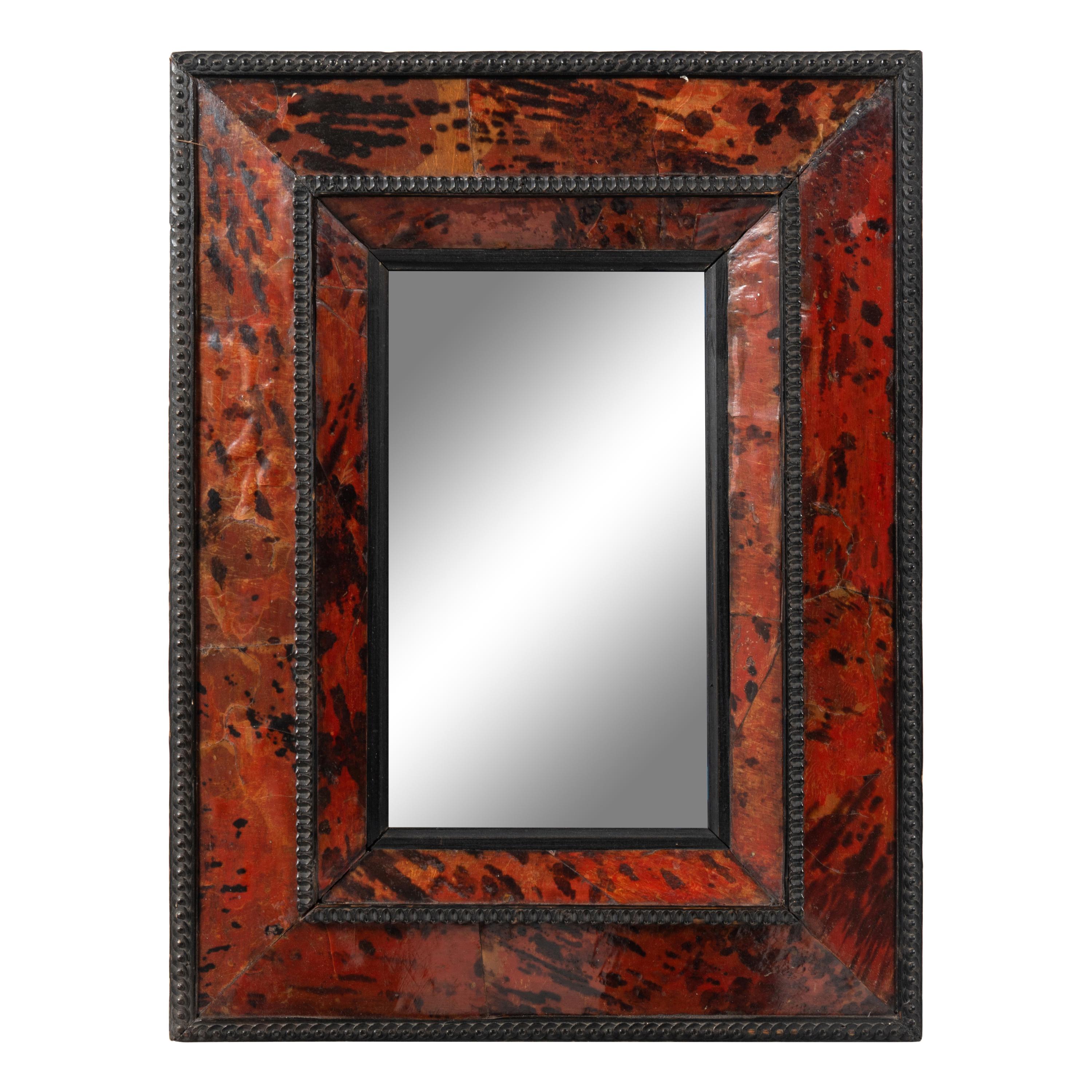 A Flemish Tortoise Shell and Part Ebonized Mirror