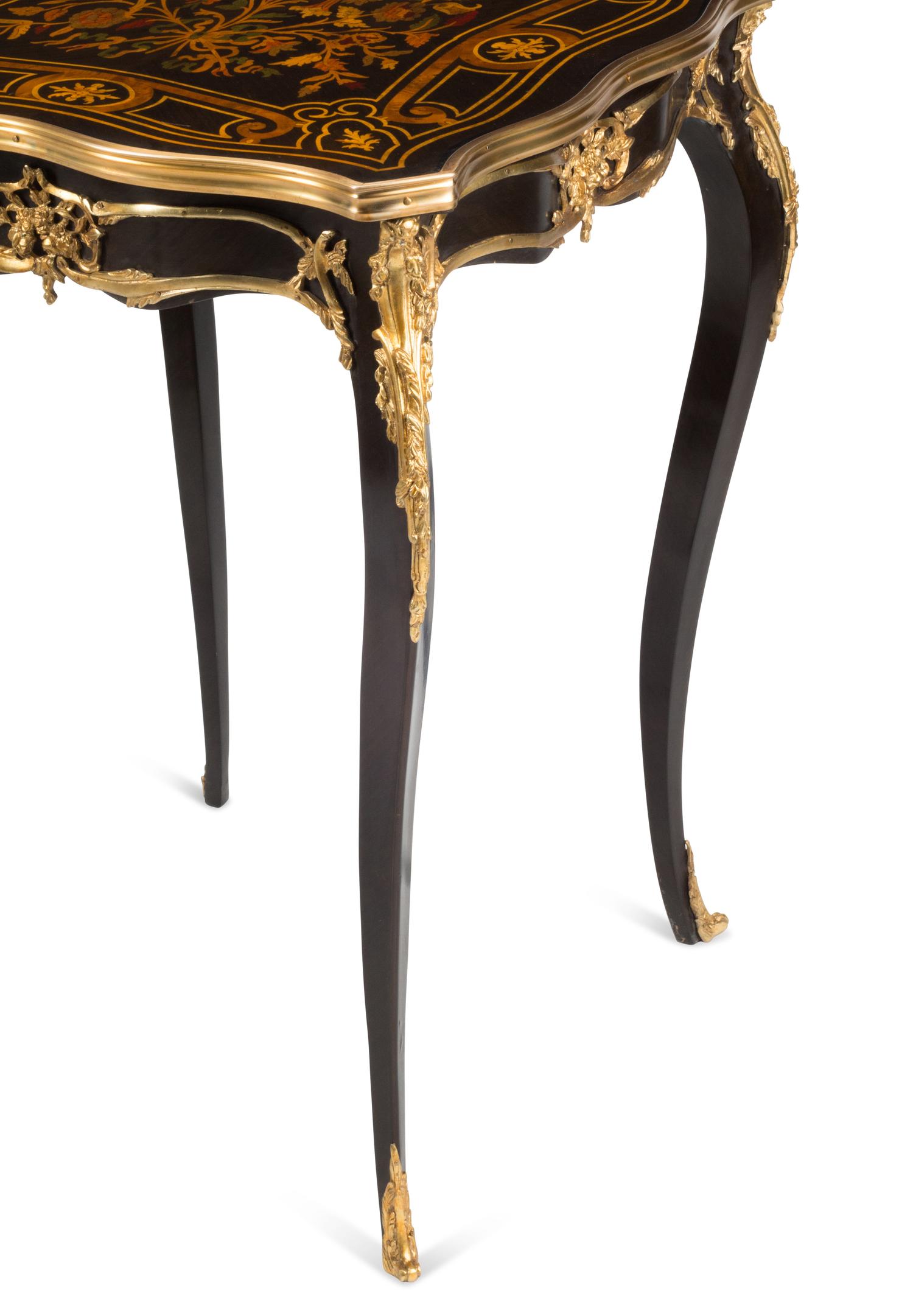 A Pair of Louis XV Style Gilt Bronze Mounted Marquetry Tables