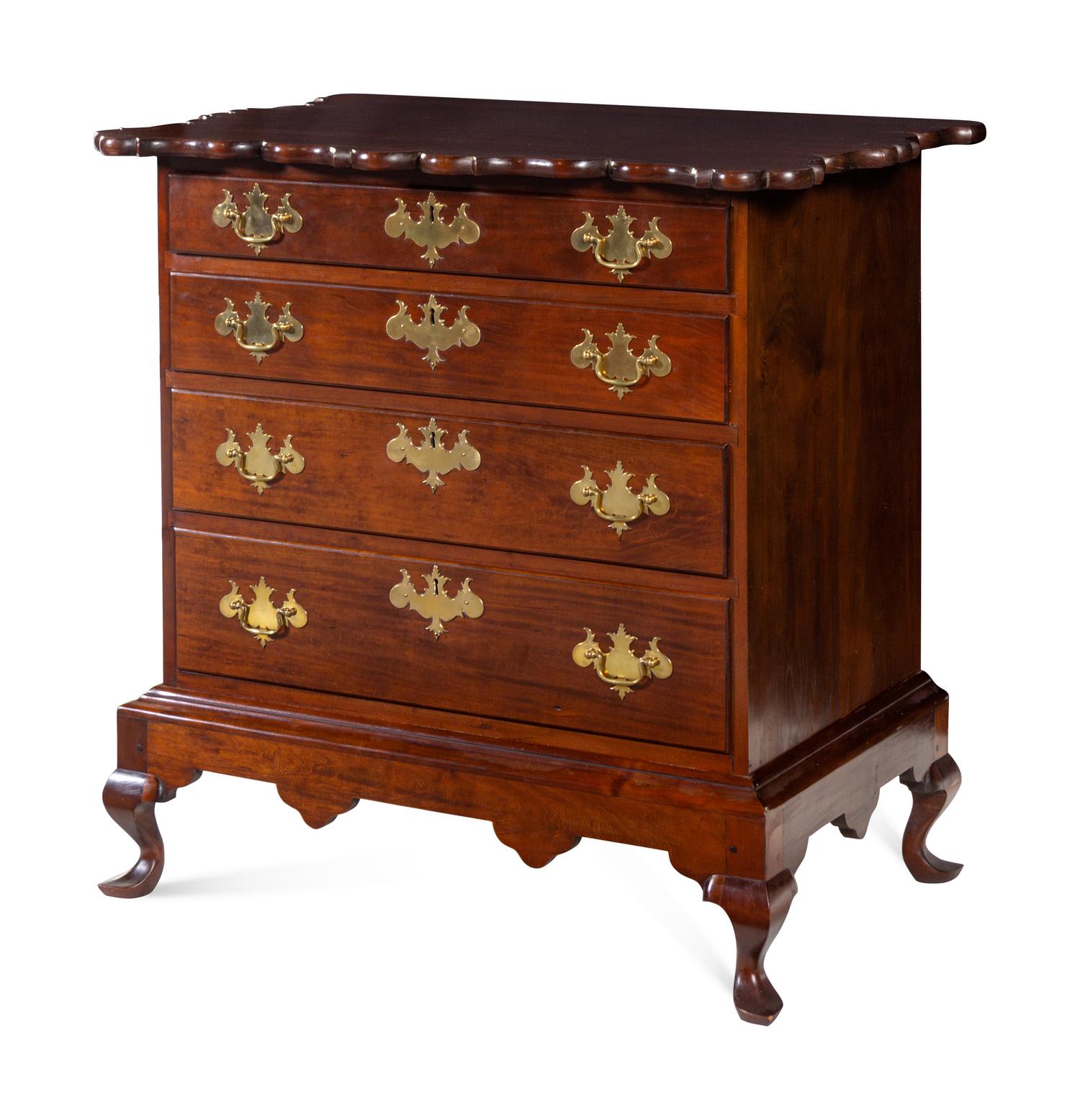 A Chippendale Style Cherry Chest of Drawers
