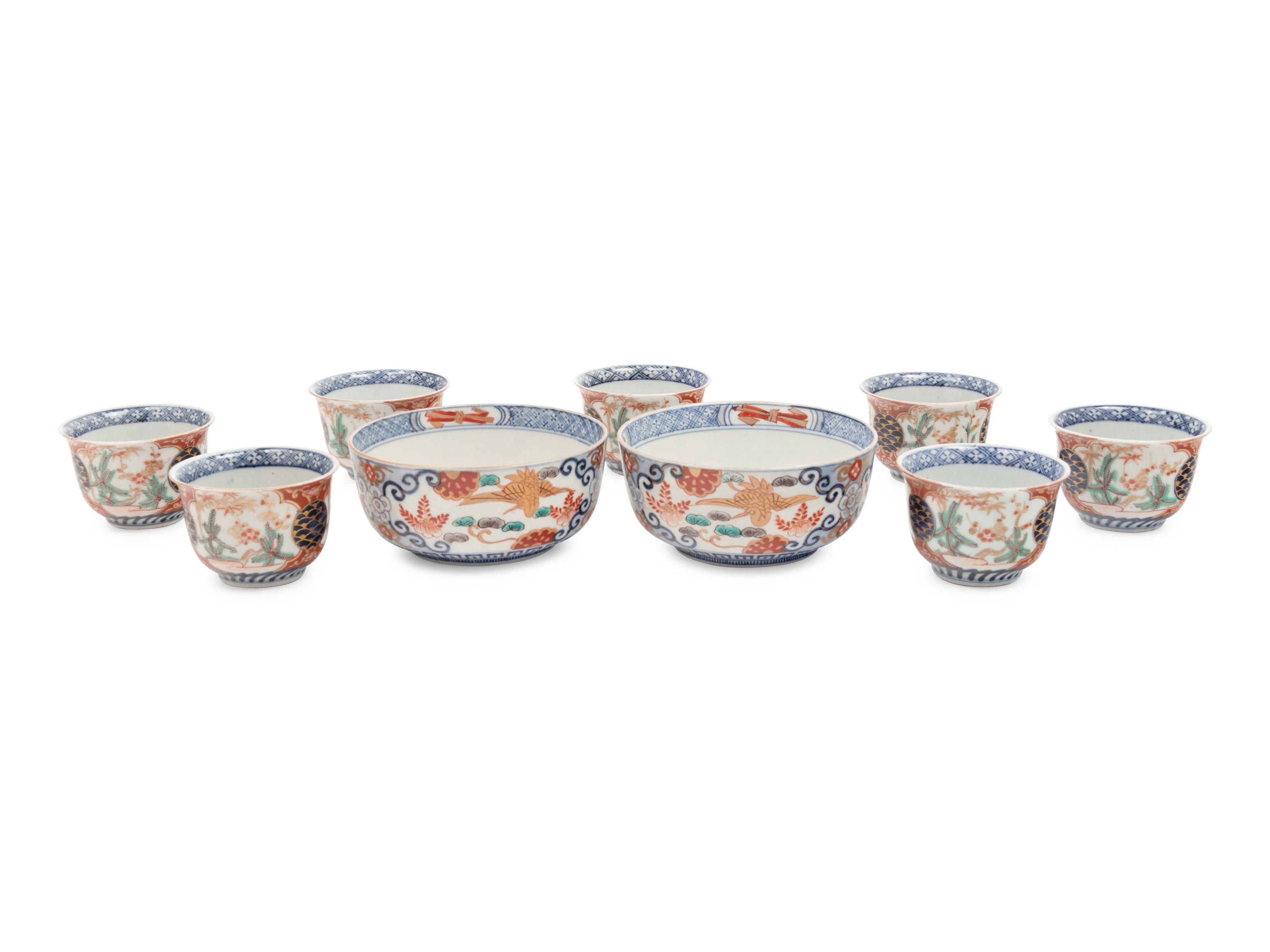 A Set of Nine Imari Palette Porcelain Teacups