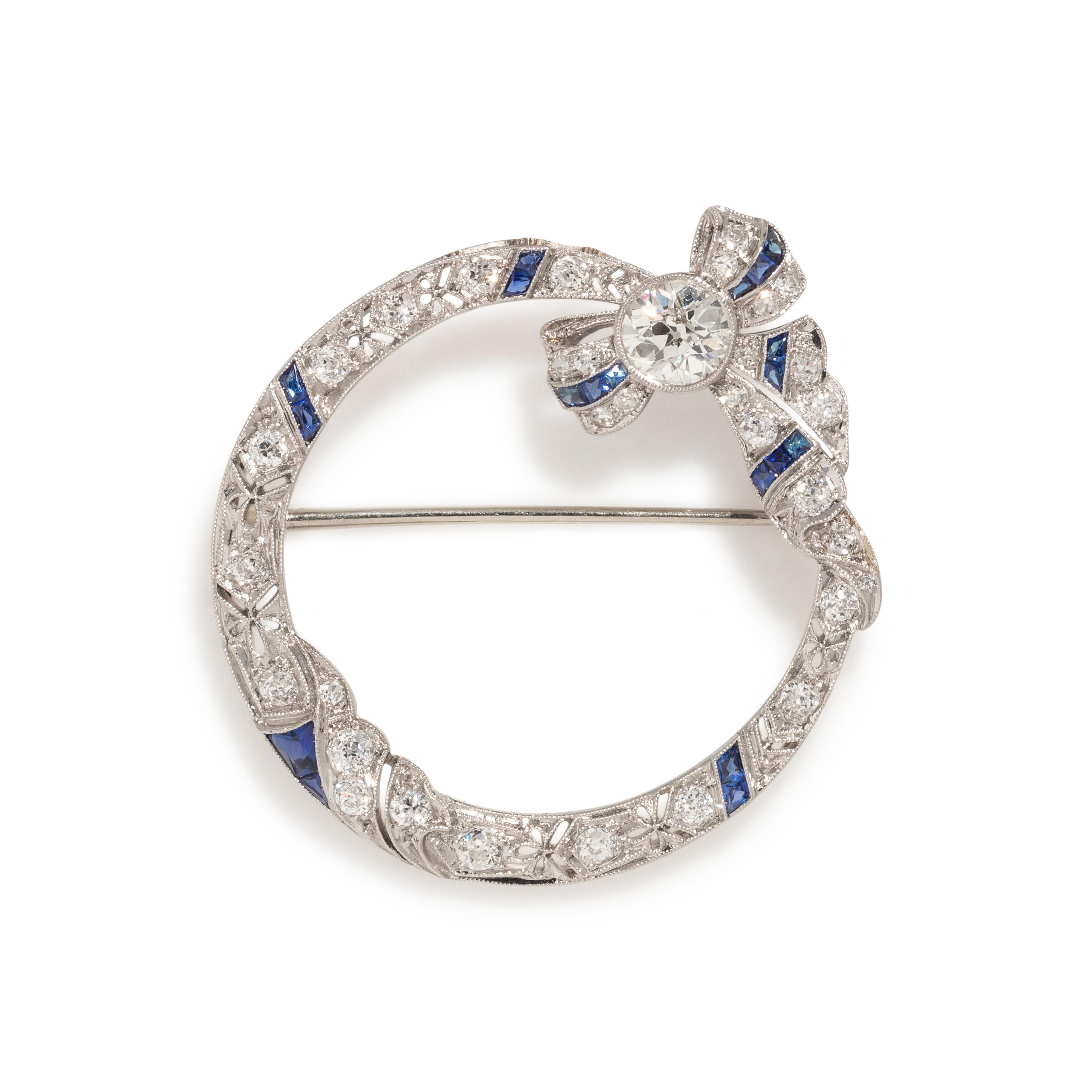 ART DECO, DIAMOND AND SAPPHIRE CIRCLE BROOCH