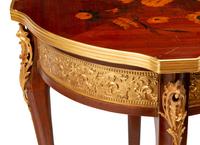 A Pair of Louis XV Style Gilt Metal Mounted Marquetry Tables