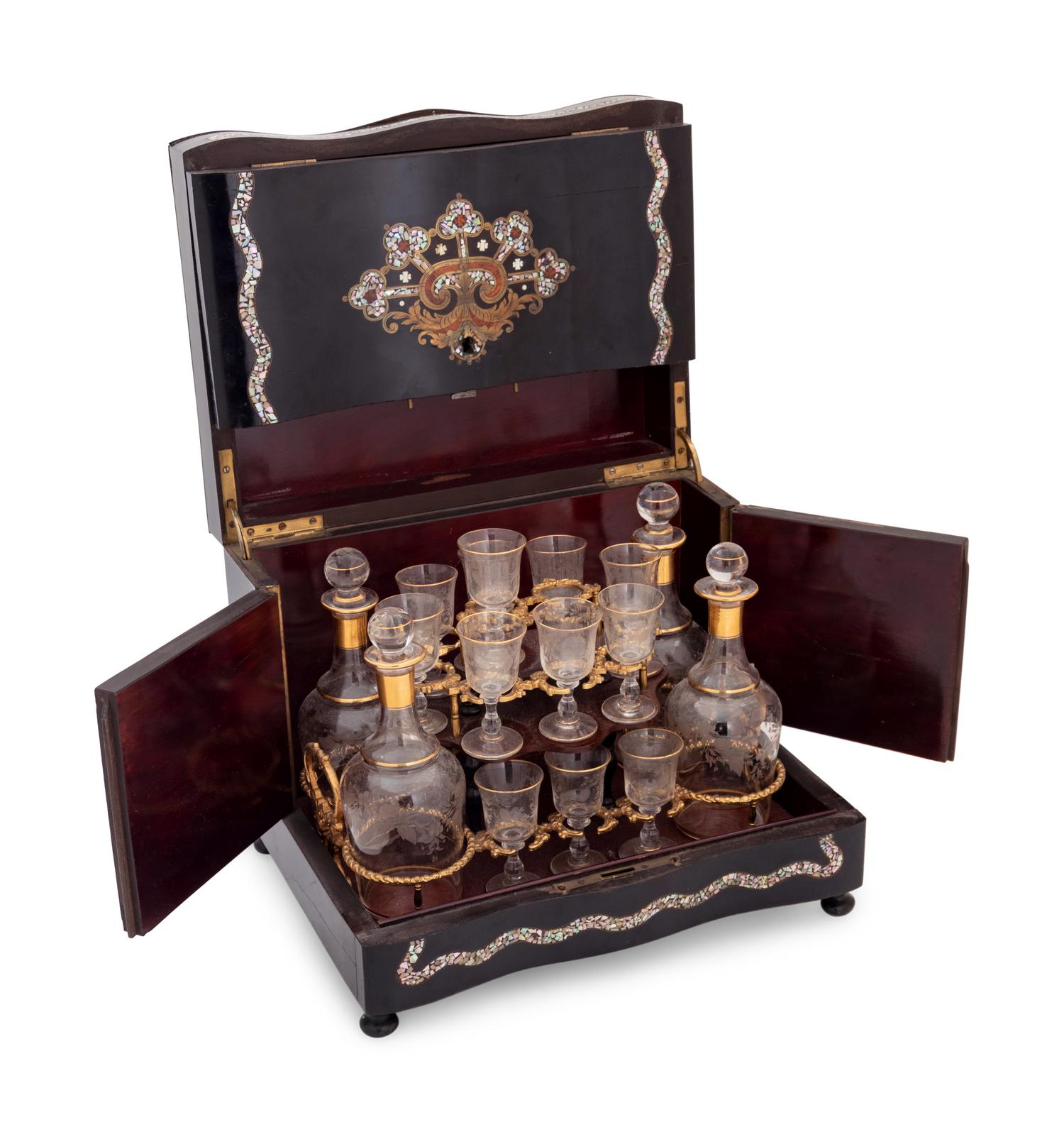A Napoleon III Brass and Mother-of-Pearl Inlaid Ebonized Cave à Liqueur