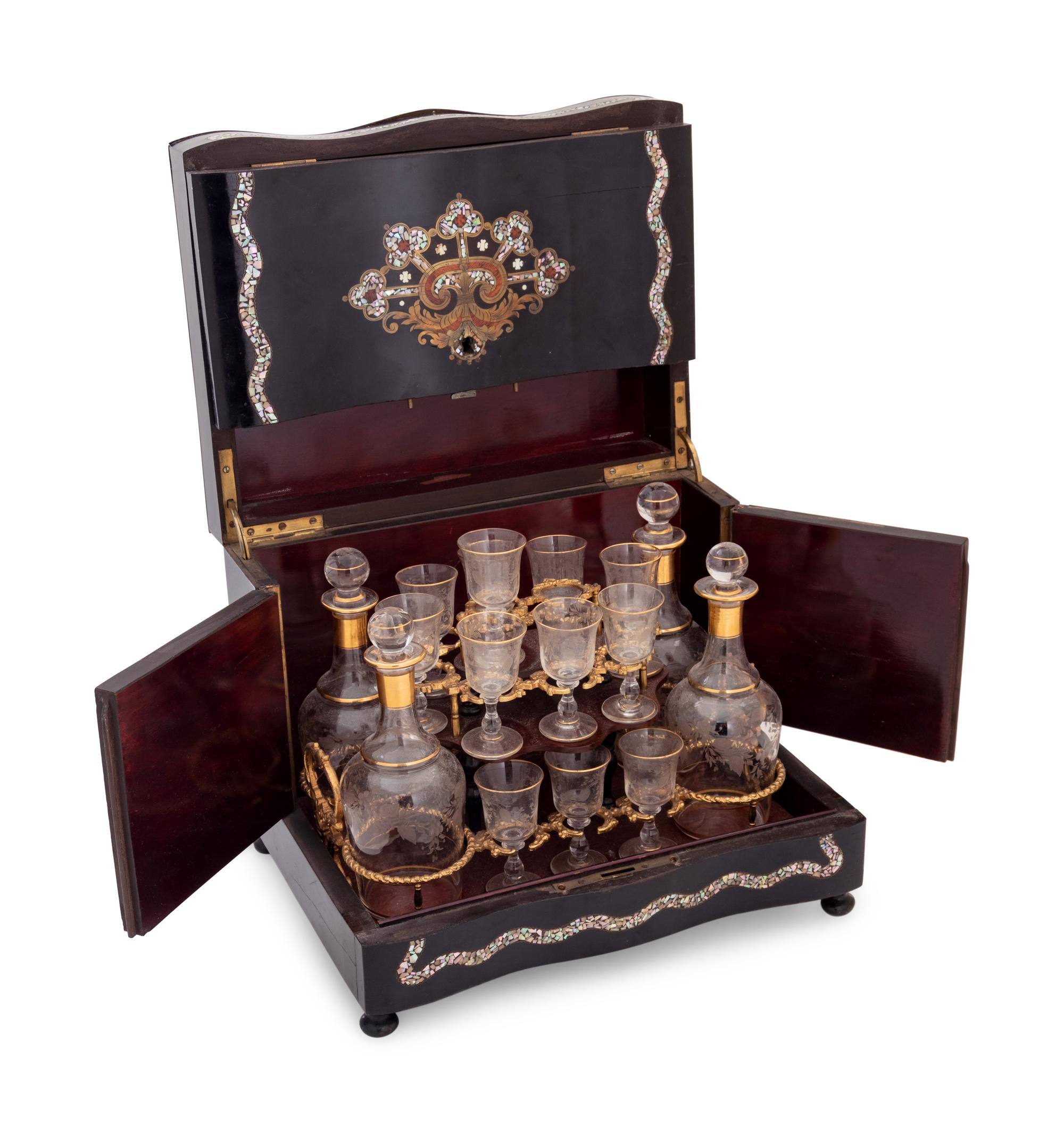A Napoleon III Brass and Mother-of-Pearl Inlaid Ebonized Cave à Liqueur