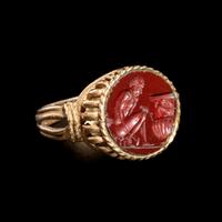 A Roman Red Jasper Ring Stone of a Nude Sculptor