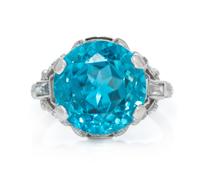 An Art Deco Platinum, Blue Zircon, White Sapphire and Diamond Ring, 4.40 dwts.