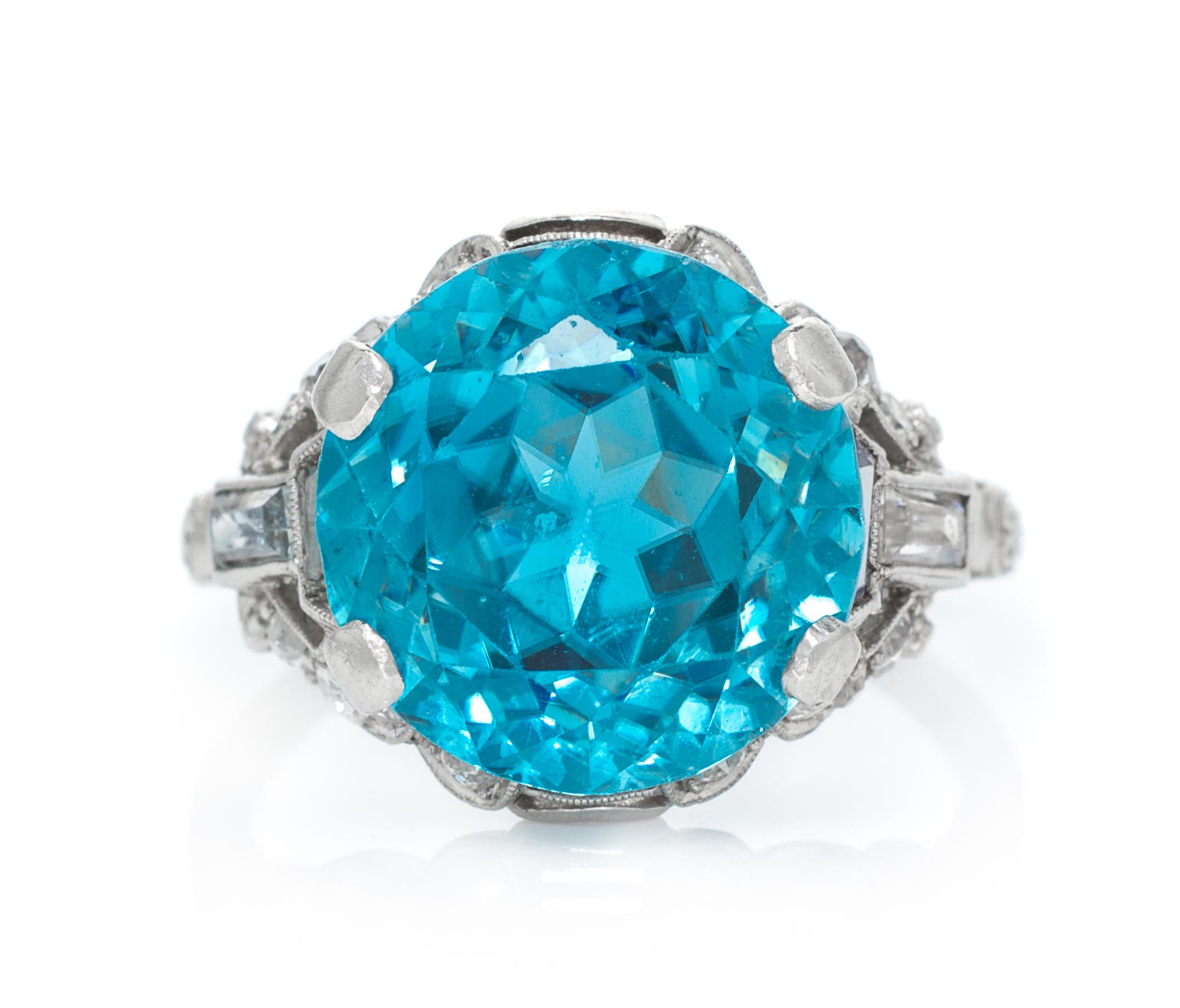 An Art Deco Platinum, Blue Zircon, White Sapphire and Diamond Ring, 4.40 dwts.