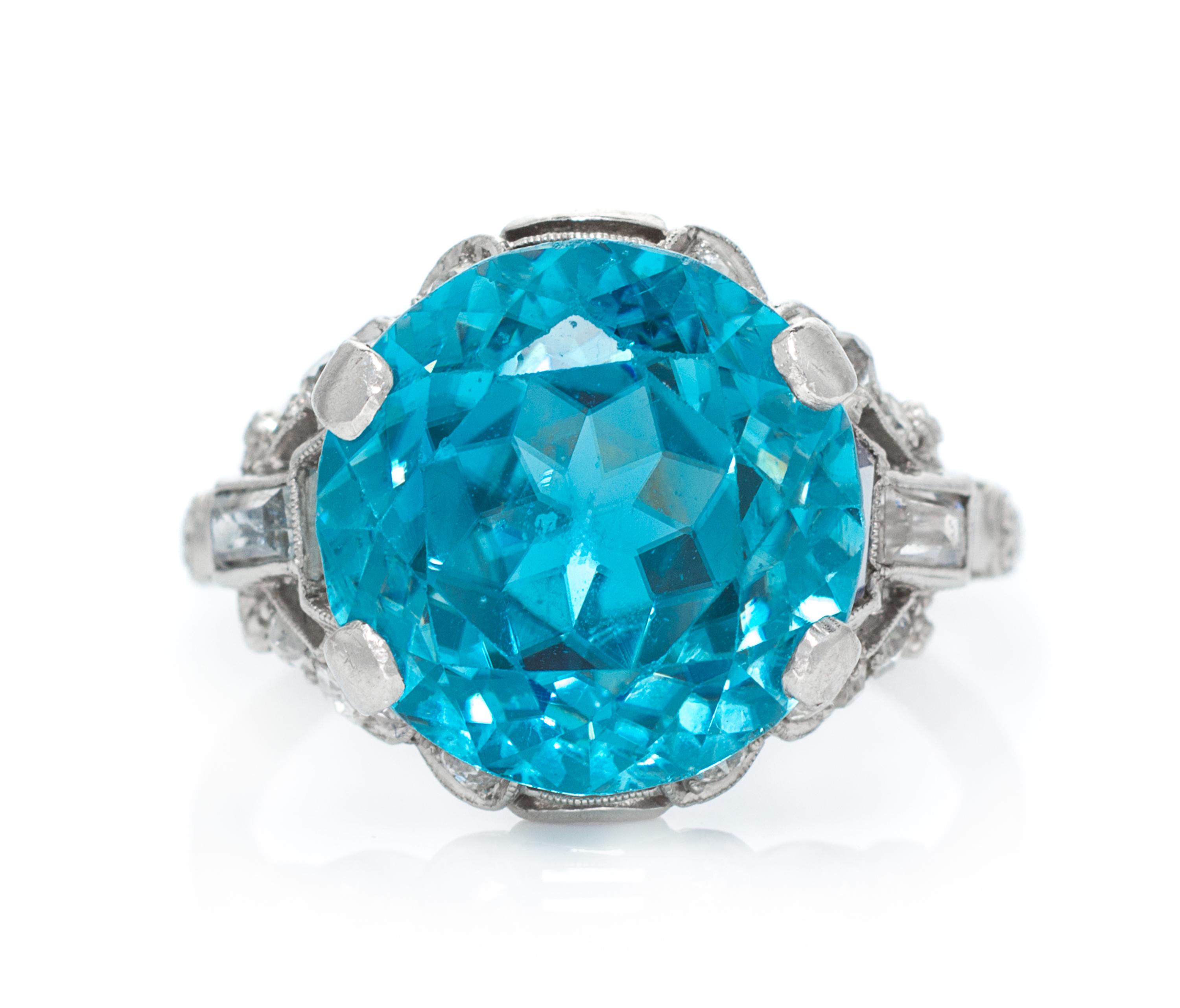 An Art Deco Platinum, Blue Zircon, White Sapphire and Diamond Ring, 4.40 dwts.