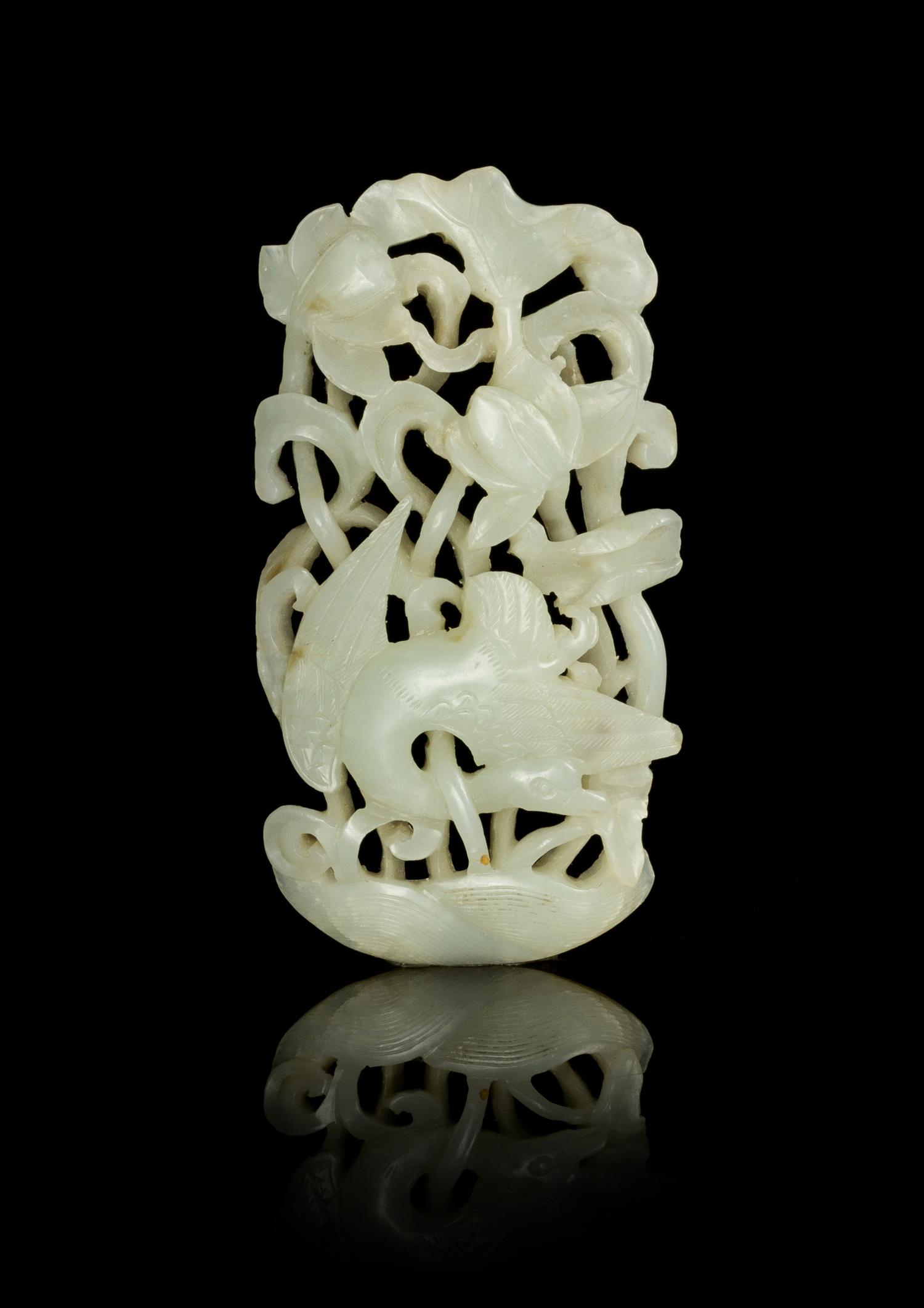A Reticulated Celadon Jade Pendant Length 3 1/4 inches.