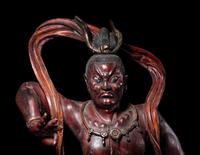 A Chinese Painted Wood Figure of a Guardian