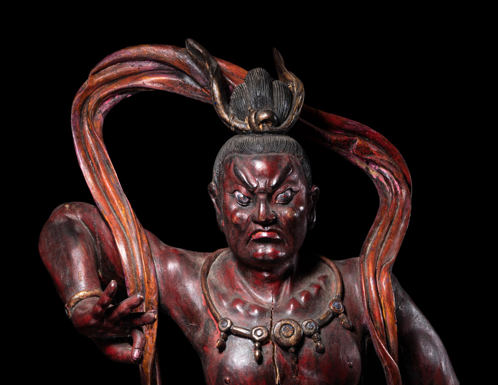 A Chinese Painted Wood Figure of a Guardian