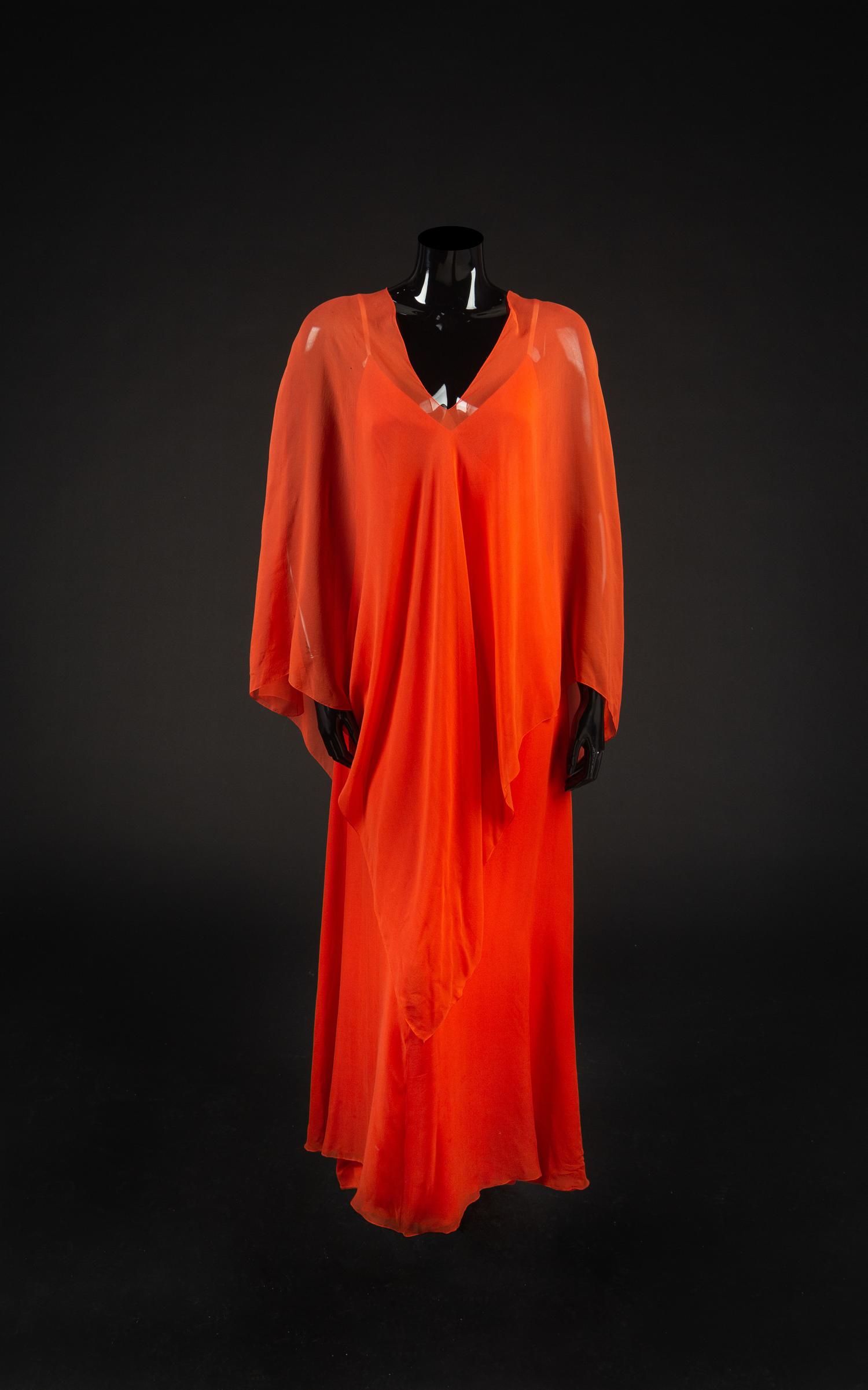 Dress and Poncho, 1970s. Dress designed by Edith Head and made by Western Costume Company in Los Angeles. — Worn by Dame Olivia de Havilland.
