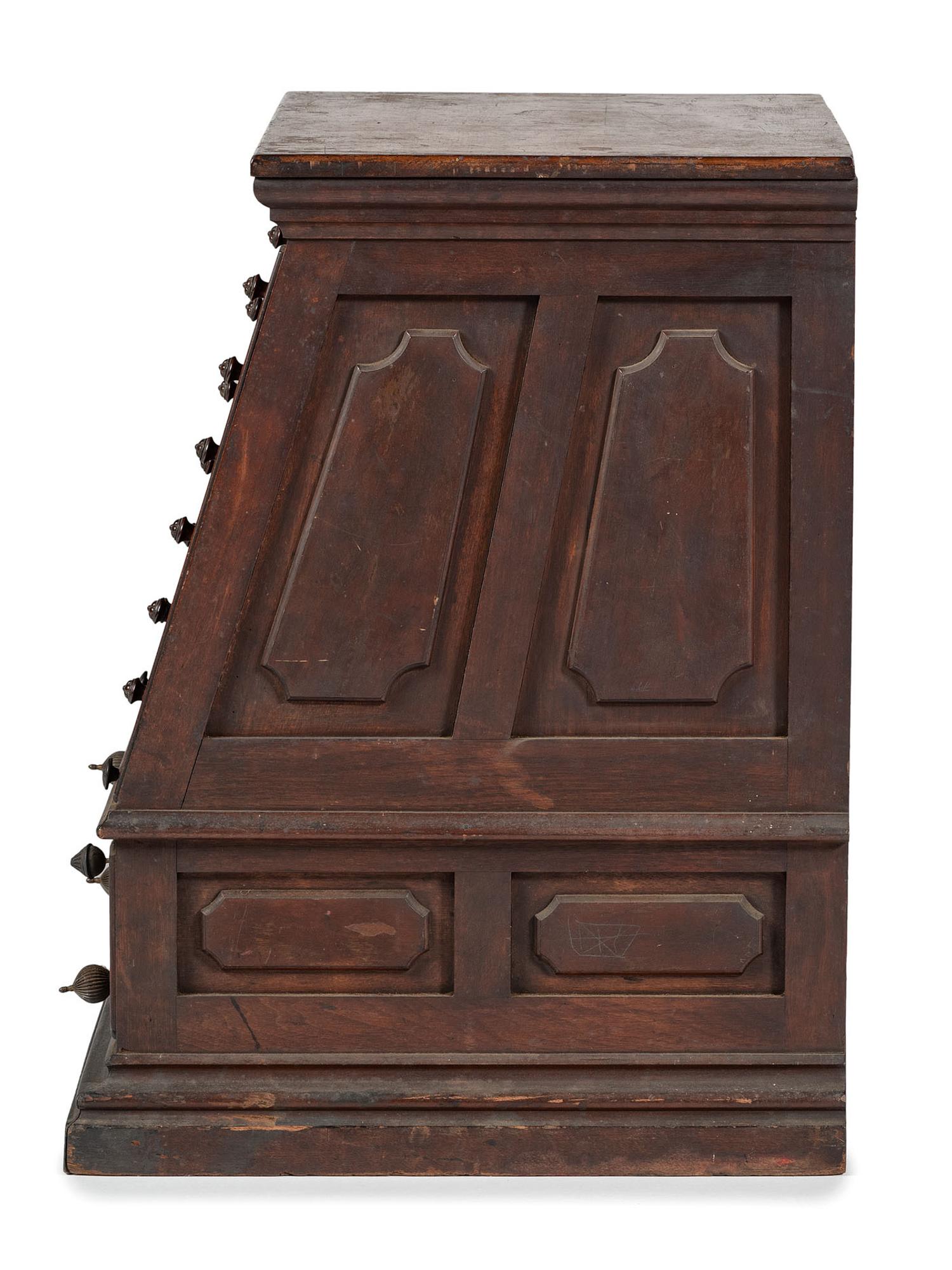 A Nine Drawer Counter Top Spool Cabinet