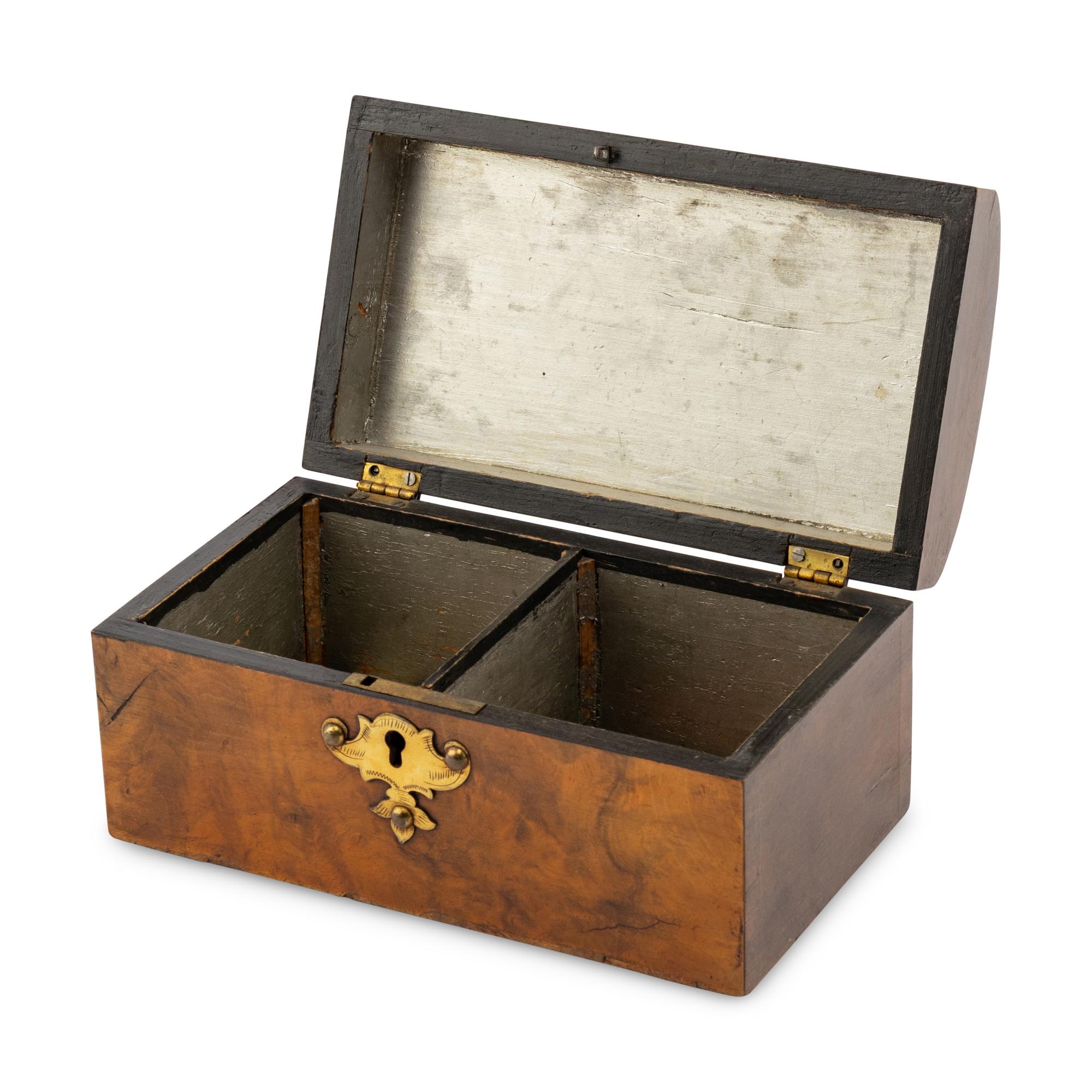 An English Walnut and Brass Mounted Tea Caddy