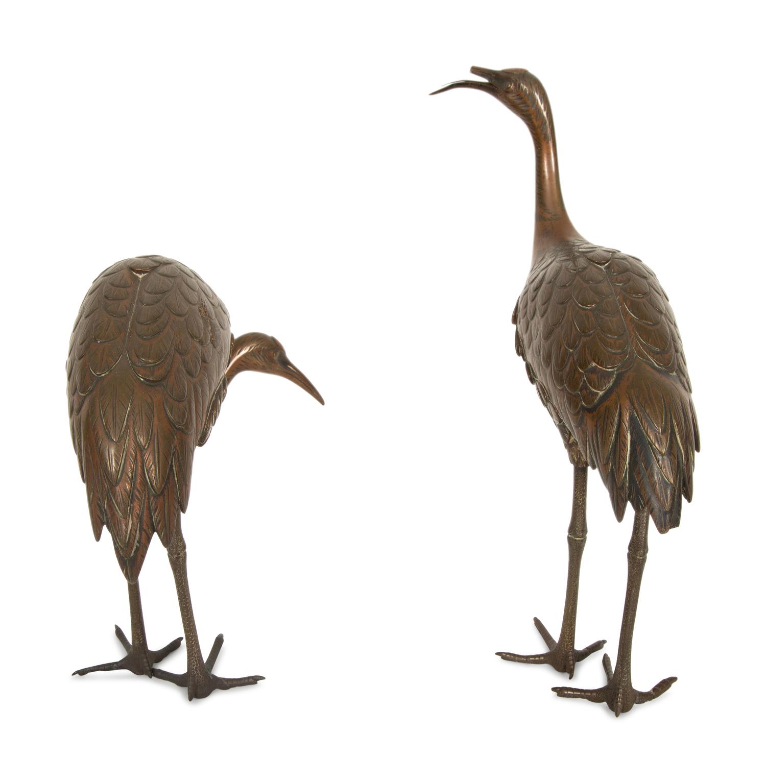A Pair of Japanese Bronze Figures of Cranes