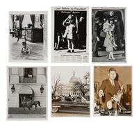 [KENNEDY, John F.] 13 press photos of John F. Kennedy, Jacqueline, their family, and the funeral.